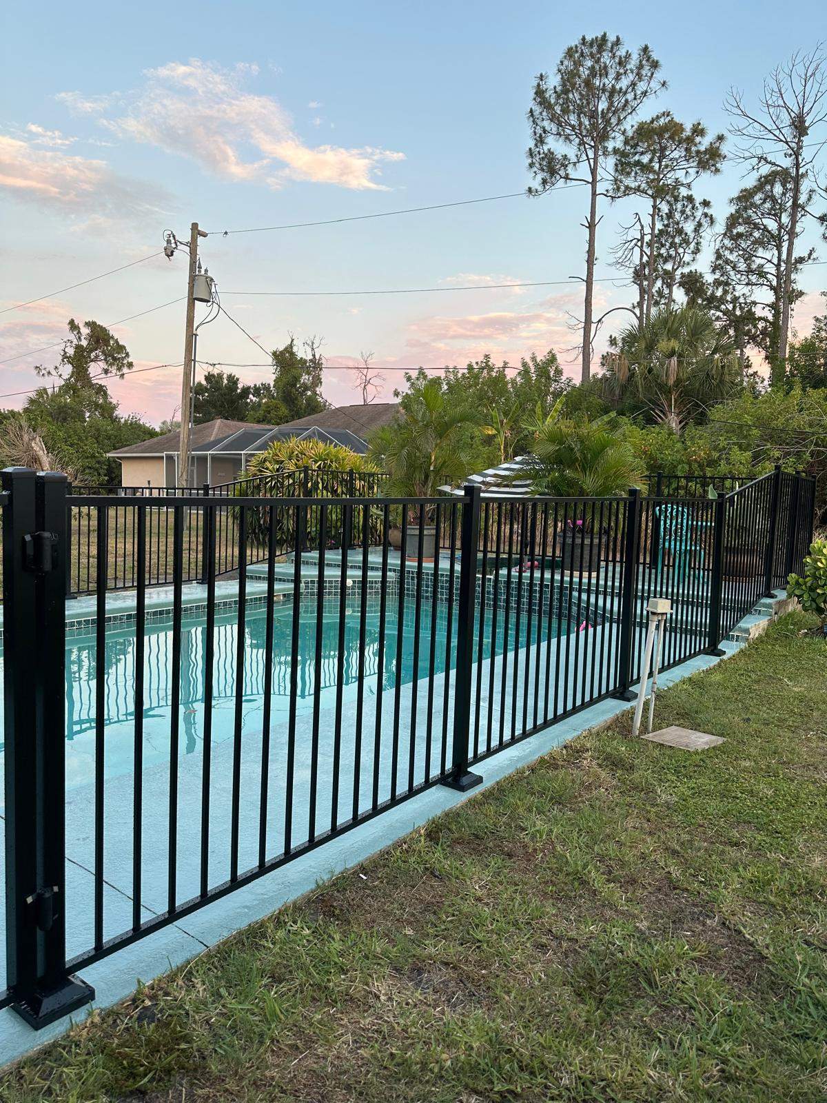 Black Aluminum Pool Fence Installation in Port Charlotte by True Fence LLC