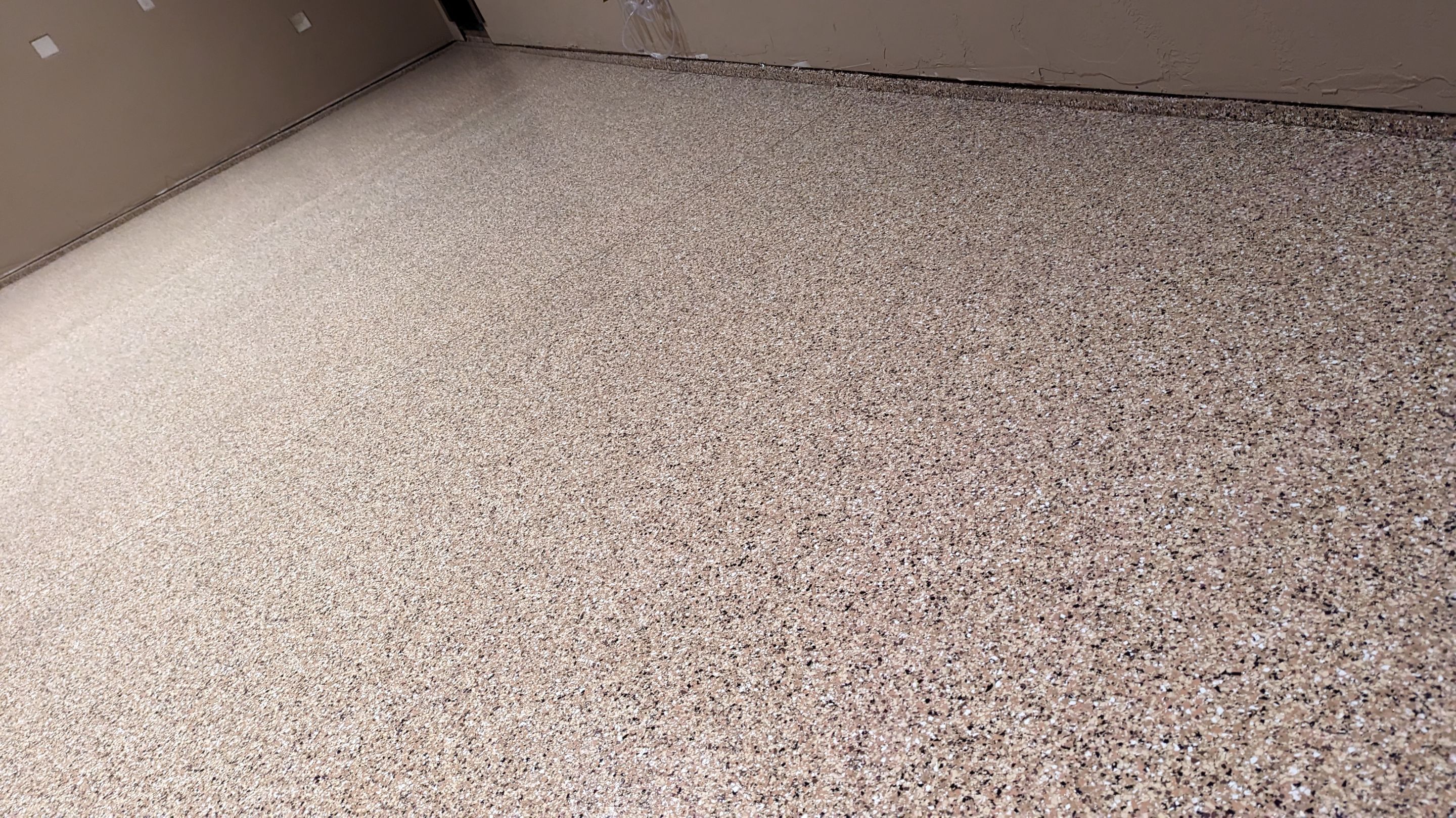 Shop Transformation using Sandstone by Croc Coatings, LLC