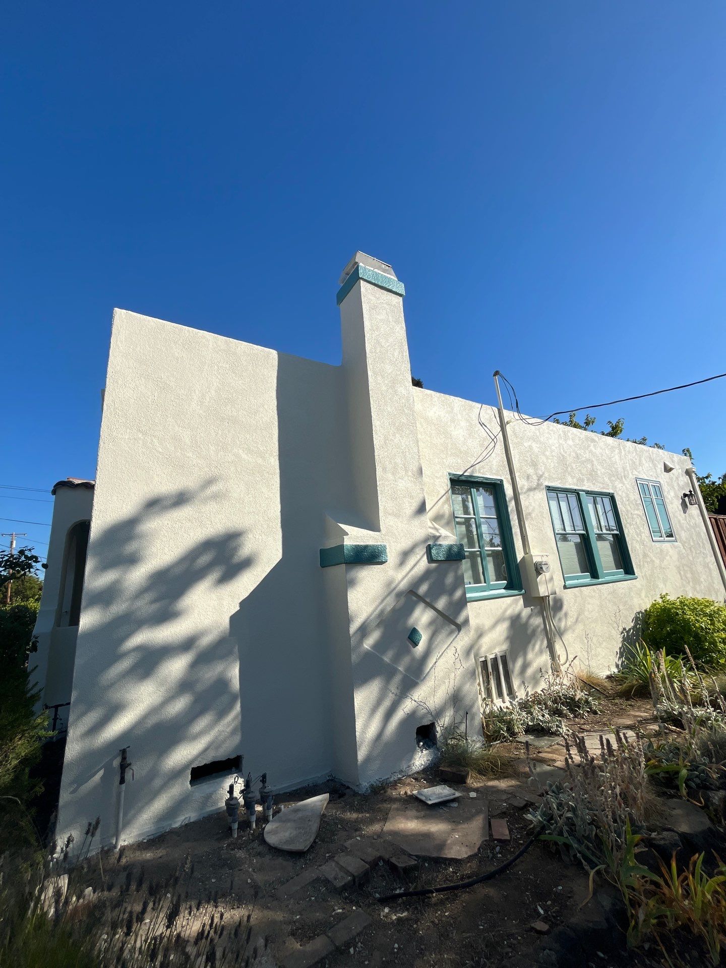 Exterior Transformation with Fresh Stucco and elastomeric system for waterproofing by Herrera’s Bay Area Painting inc.