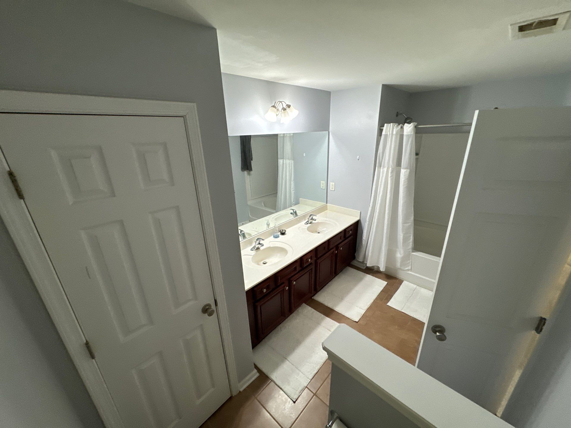 Tub to walk-in shower conversion, and tile flooring by Prudencio