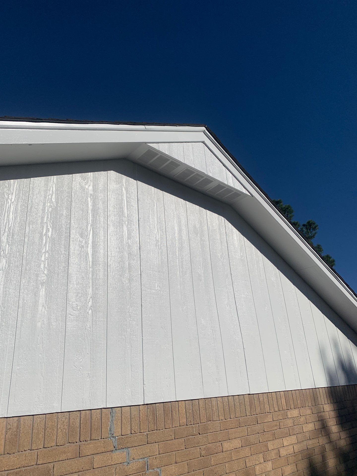 gutter install & soffit repair & exterior paiting in Oklahoma City by McCann's Roofing and Construction