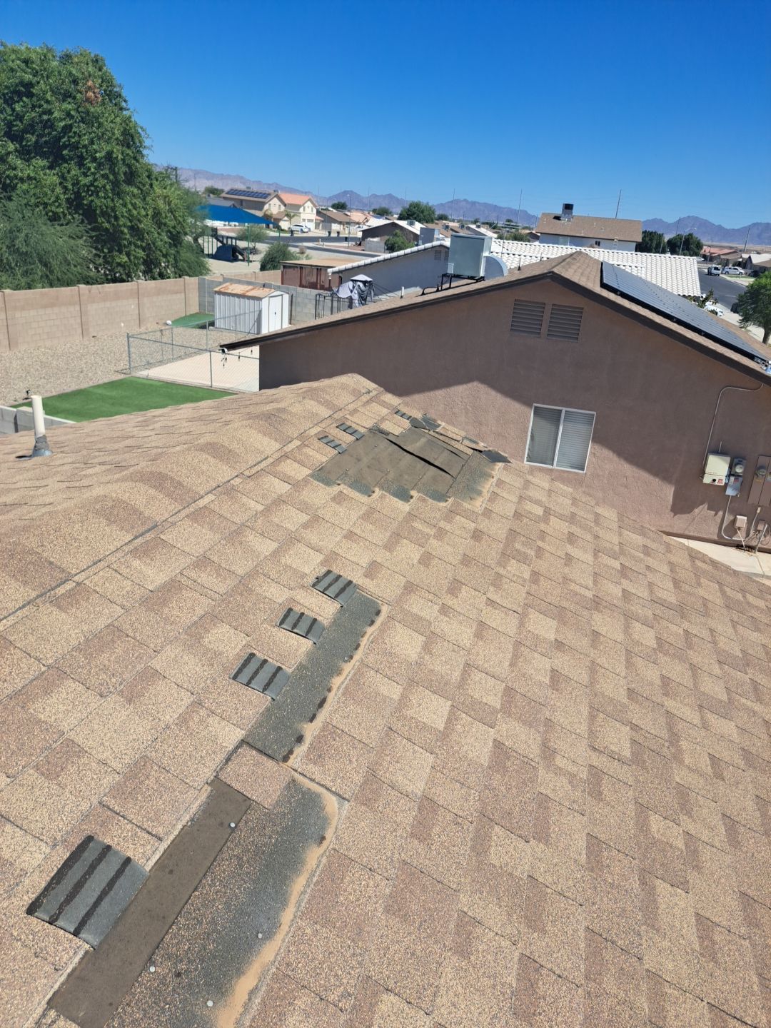 Estate Gray Shingles by Reimagine Roofing