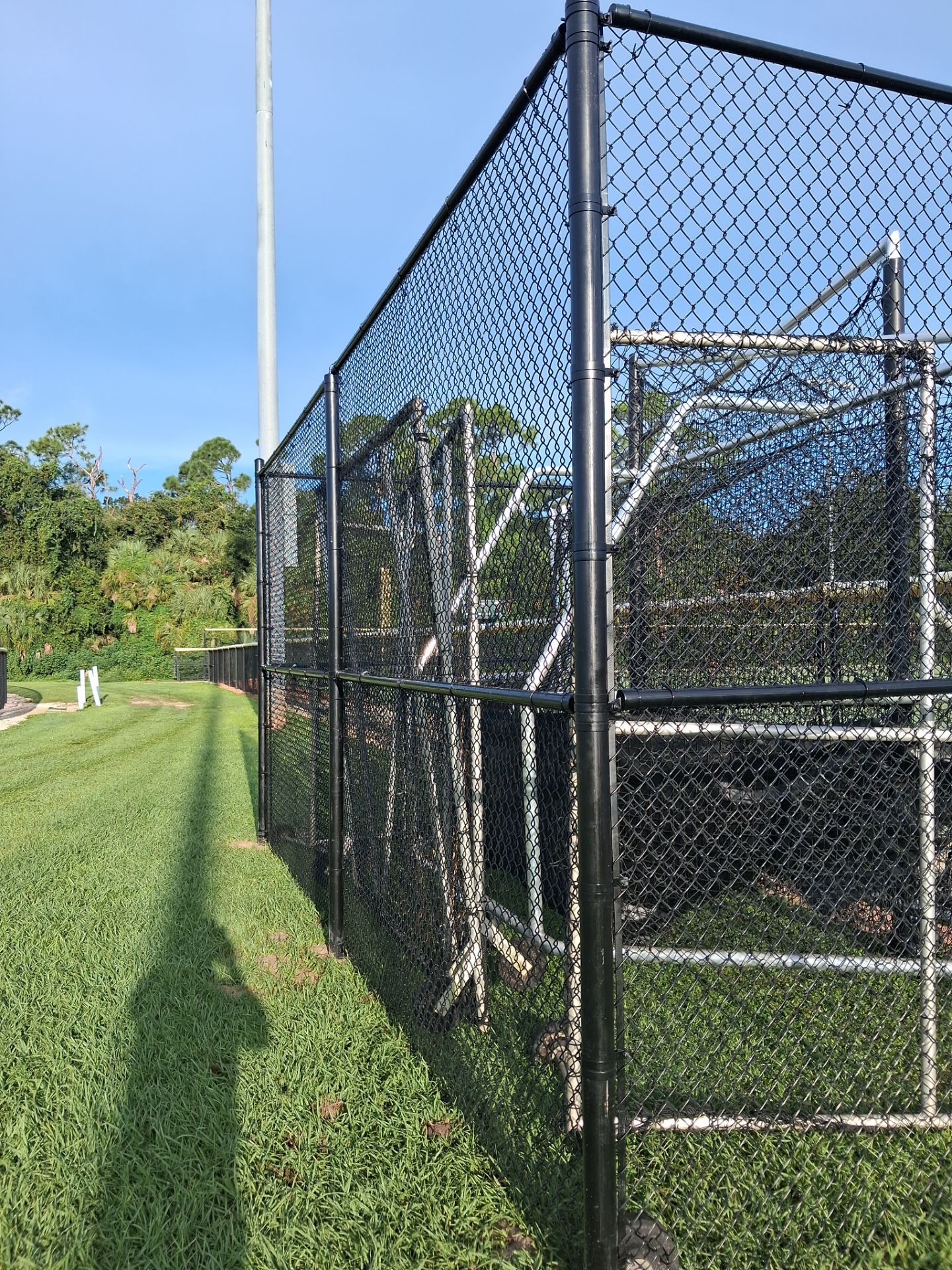 Commercial Black Chain Link Fence Installation in North Port by True Fence LLC