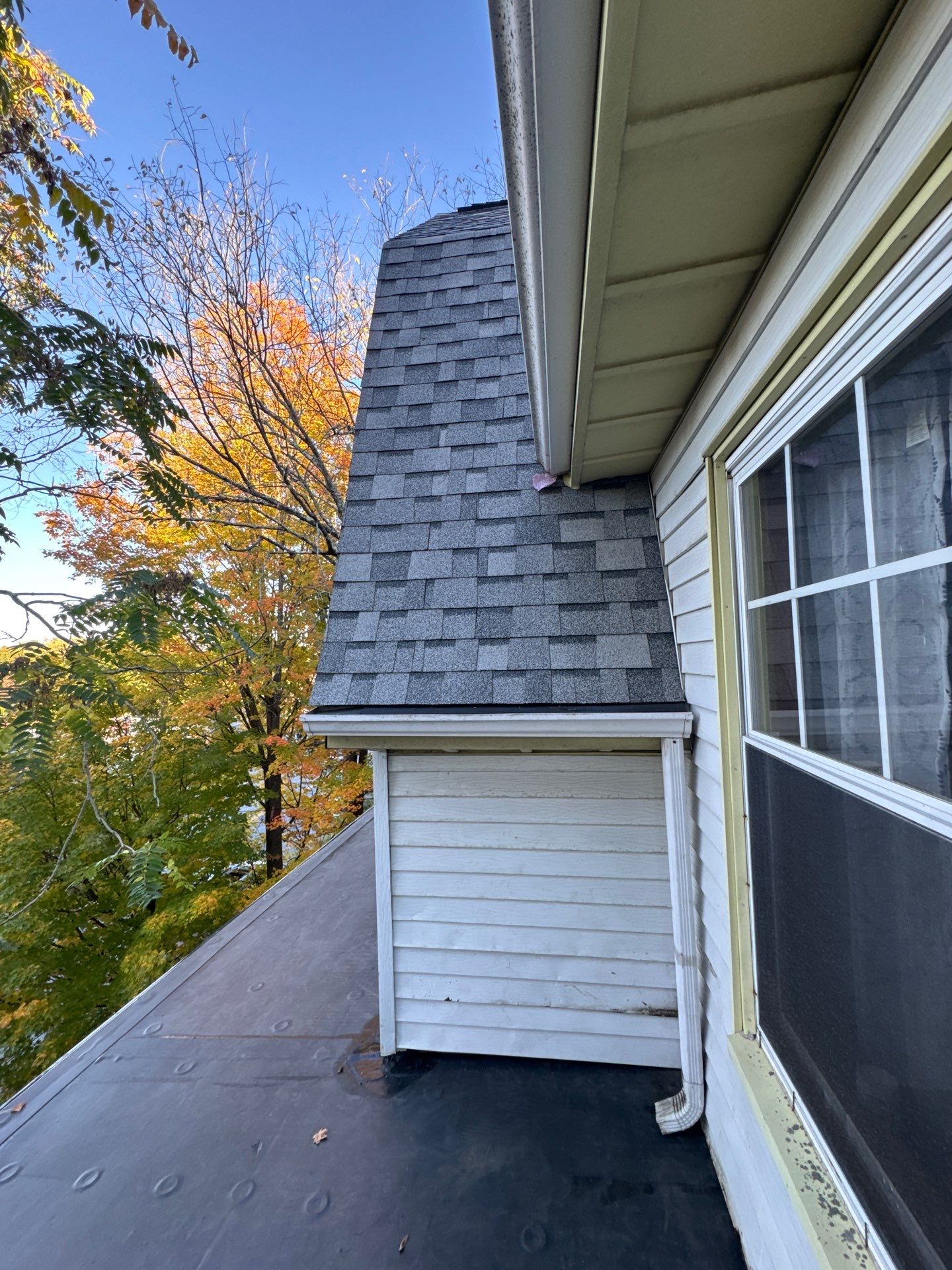 Full Roof & Porch EPDM Replacement with Skylight and Chimney Repairs by Mighty Dog Roofing of Greater Middlesex County