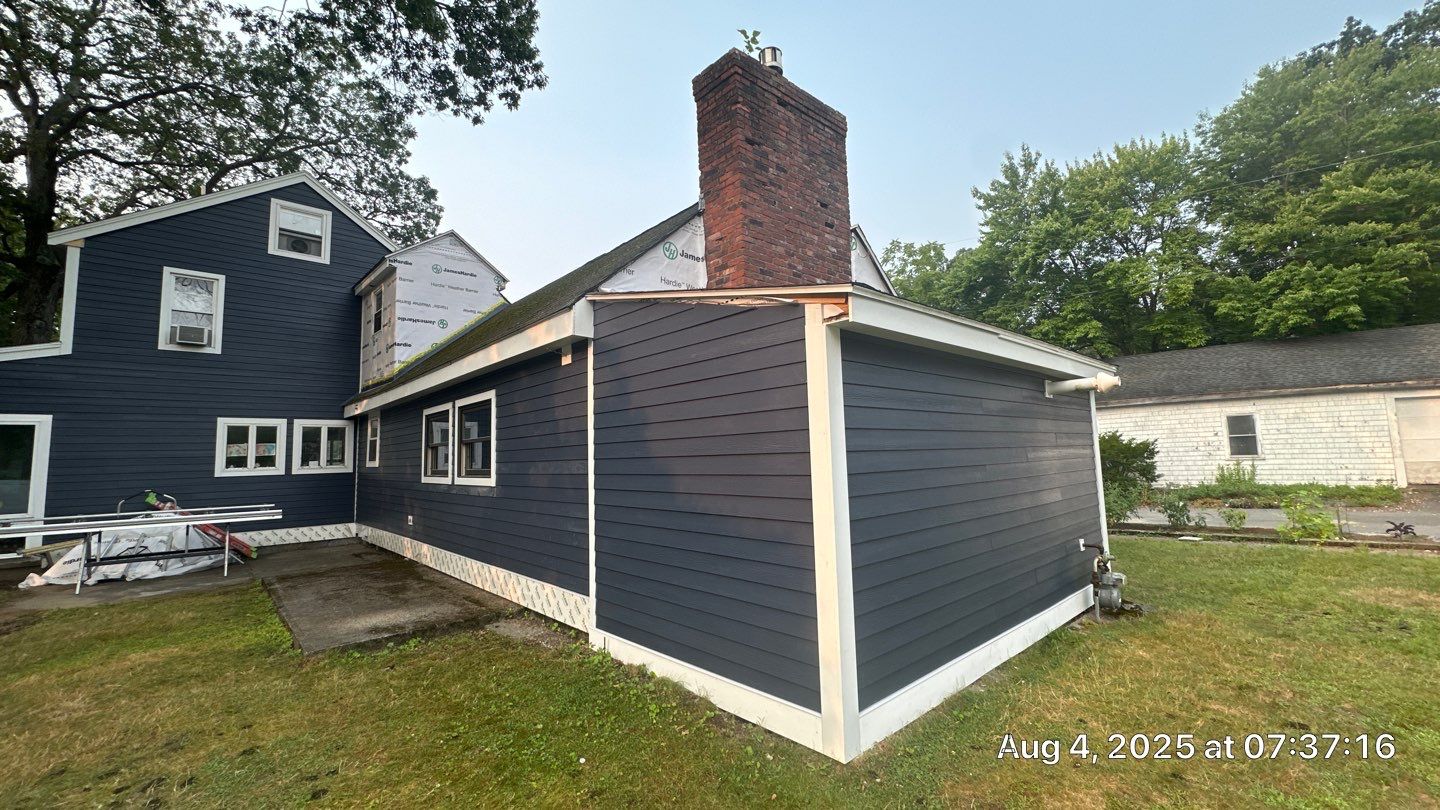 James Hardie Lap Siding Installation in Chelmsford, MA by Mighty Dog Roofing of Greater Middlesex County