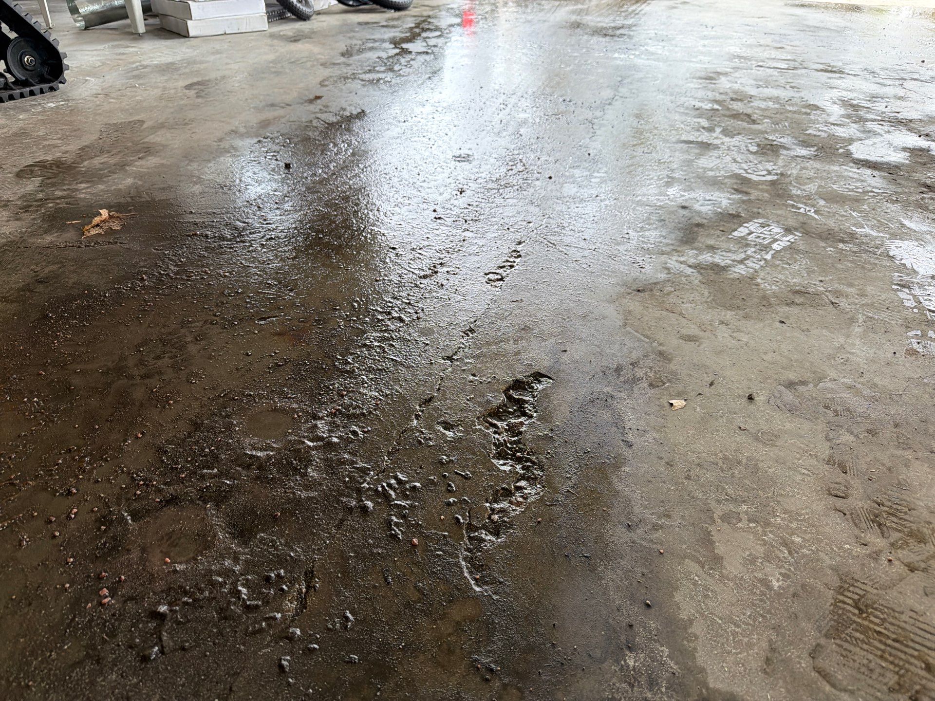 Garage Floor Concrete Coating and Crack Repair in Sioux Falls by Select Painting, Coatings & Garage Cabinets