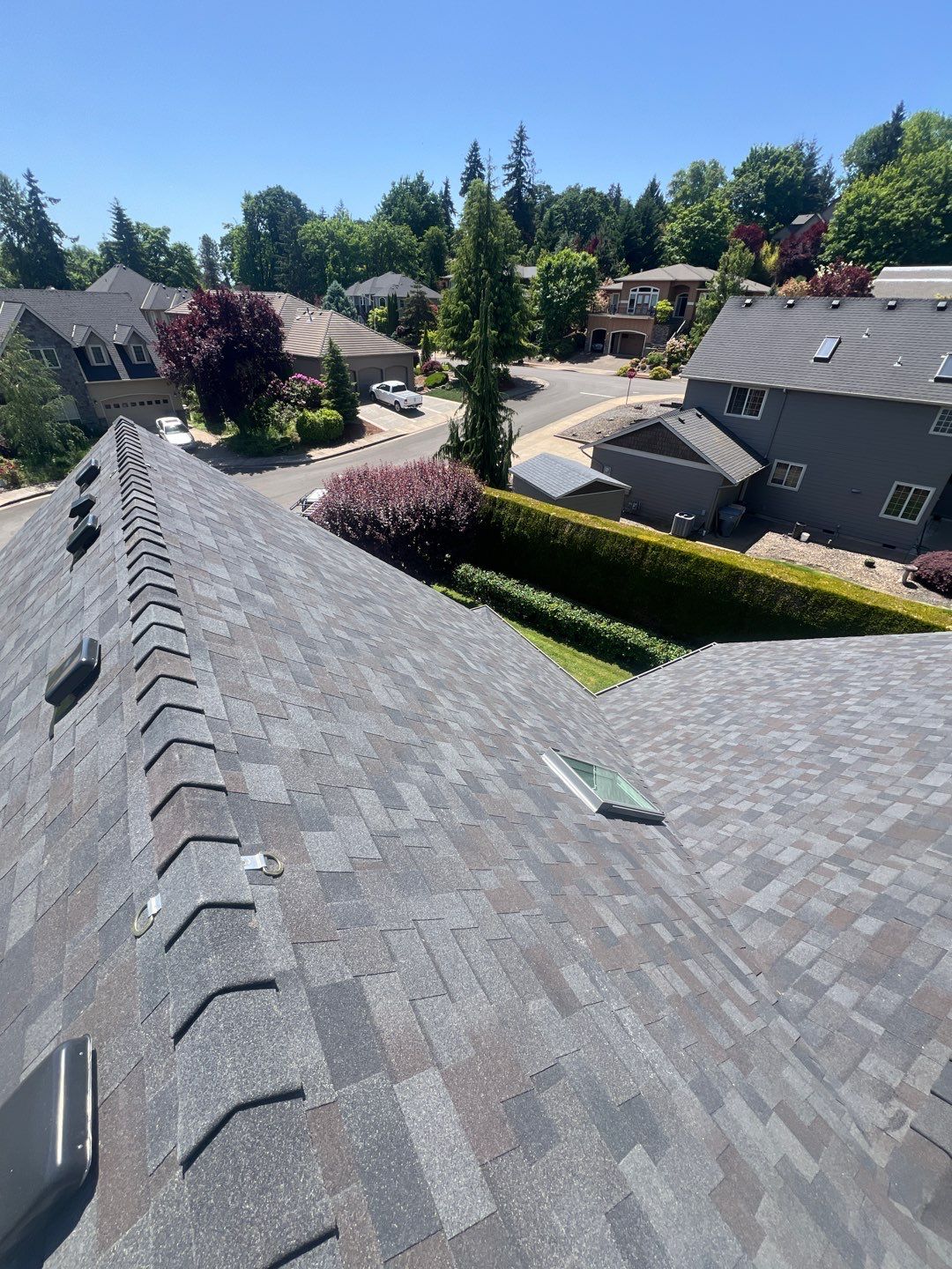 Residential Roofing Installation using Malarkey Vista (Color: Black Oak) by Orezona Building & Roofing Company, Inc.