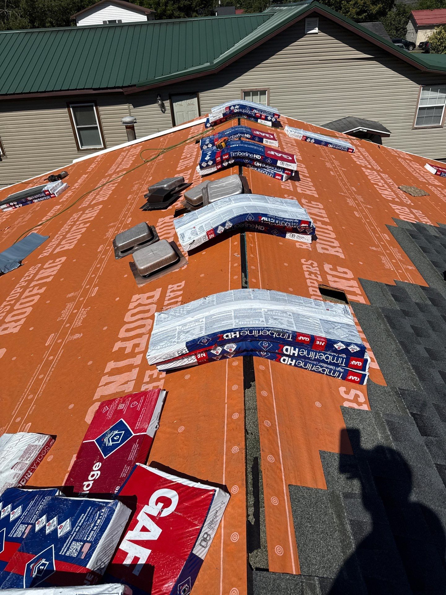 Residential Roofing Installation using GAF Timberline HDZ Charcoal by Rainstoppers Roofing