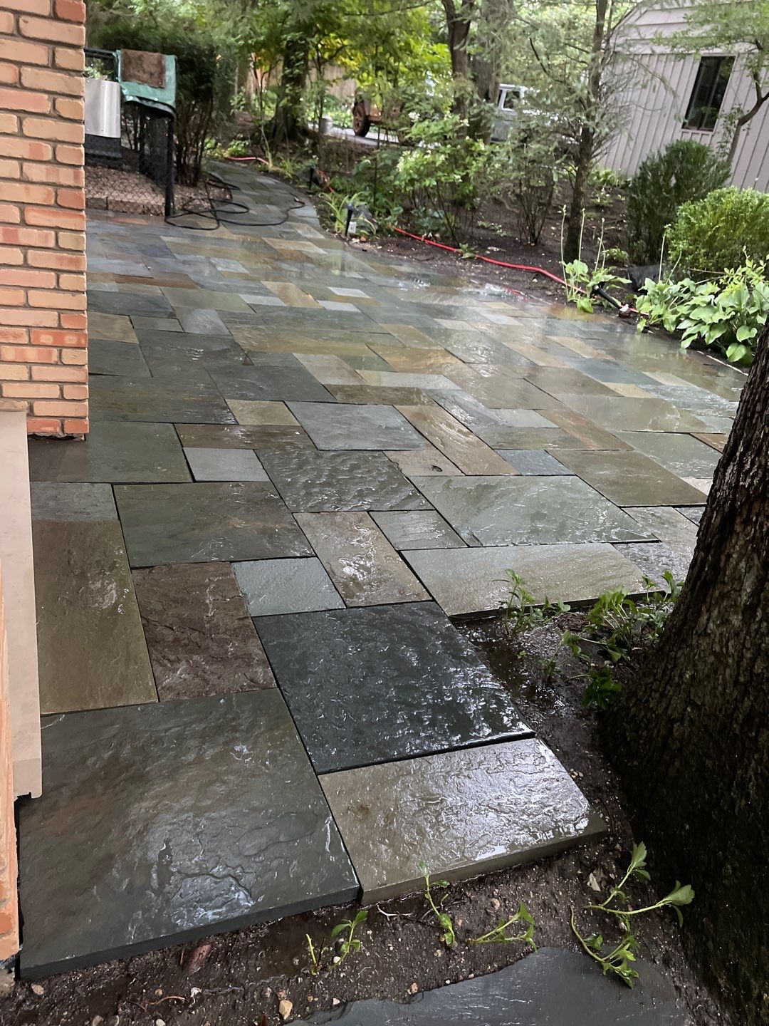 Bluestone patio cleaning by Northern Power Washing LLC.