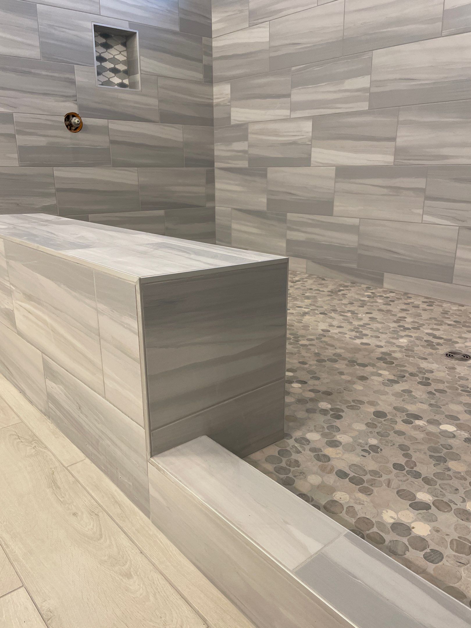 Wood Look Tile Floors and an Extra Large Shower  by Footprints Floors of Chandler 