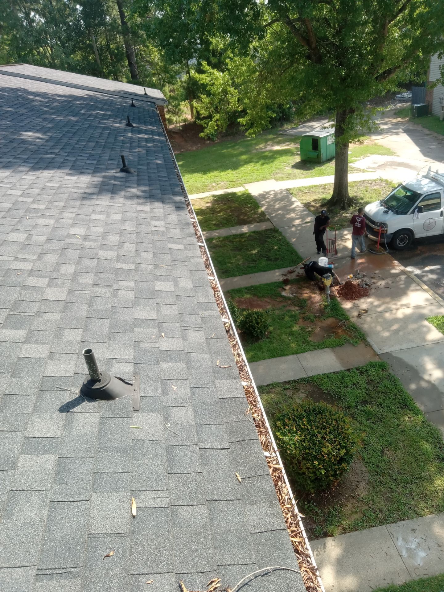 Commercial gutter cleaning Columbia, before photo with filled gutters
