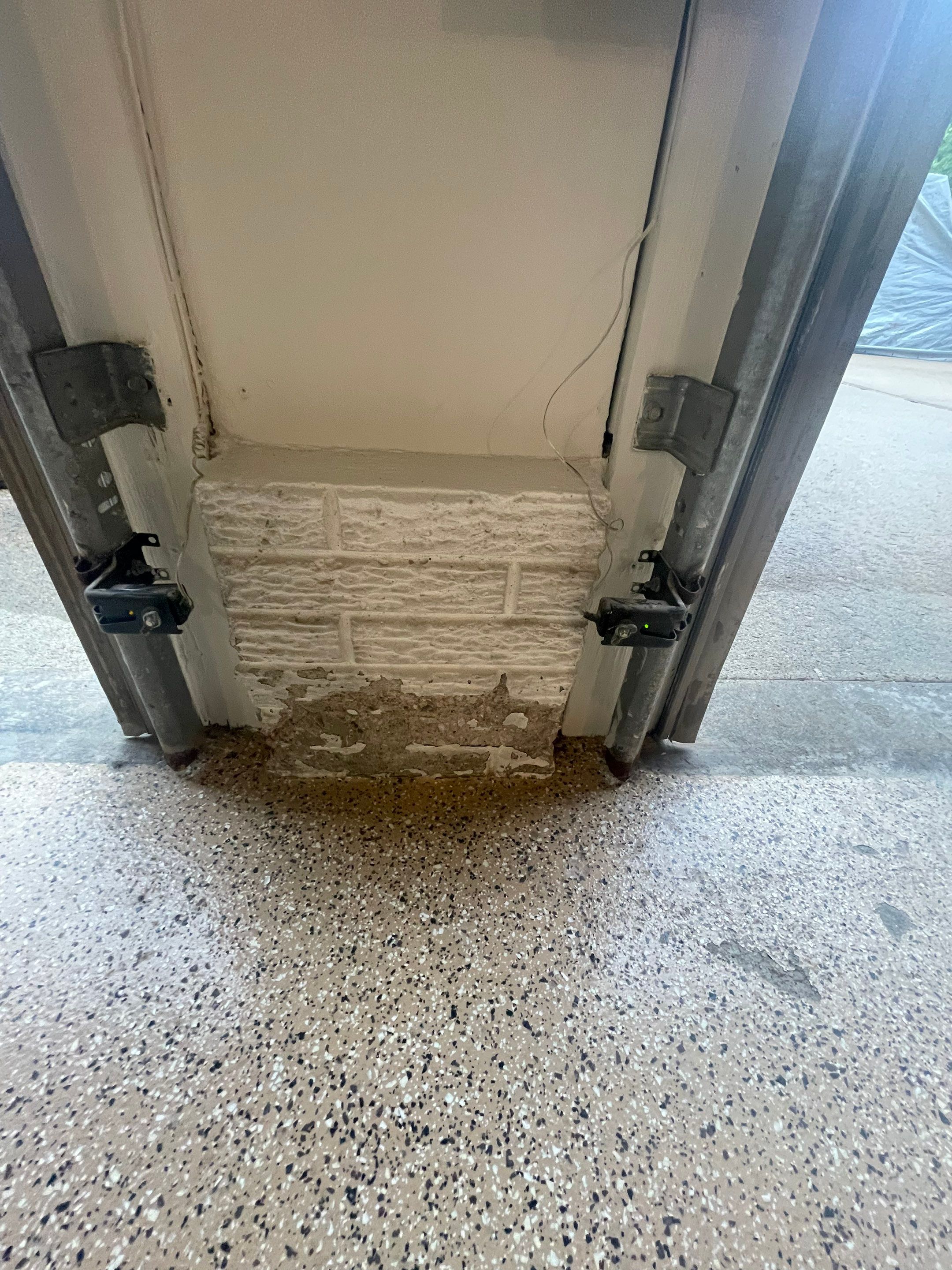 Gray Speckled Epoxy Garage Floor Coating in Sioux Falls by Select Painting, Coatings & Garage Cabinets