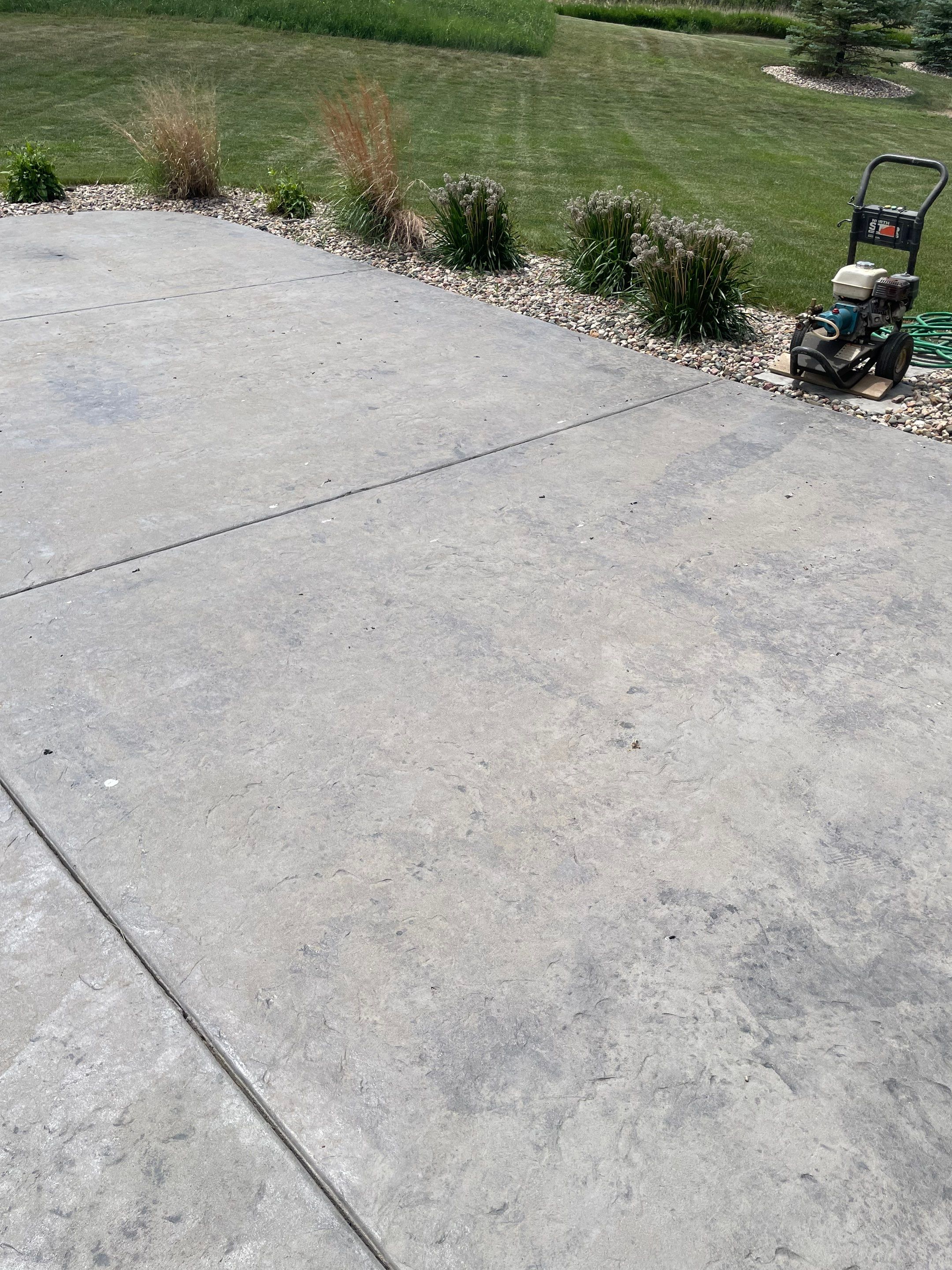 Concrete Patio Restoration and Installation in Sioux Falls by Select Painting, Coatings & Garage Cabinets