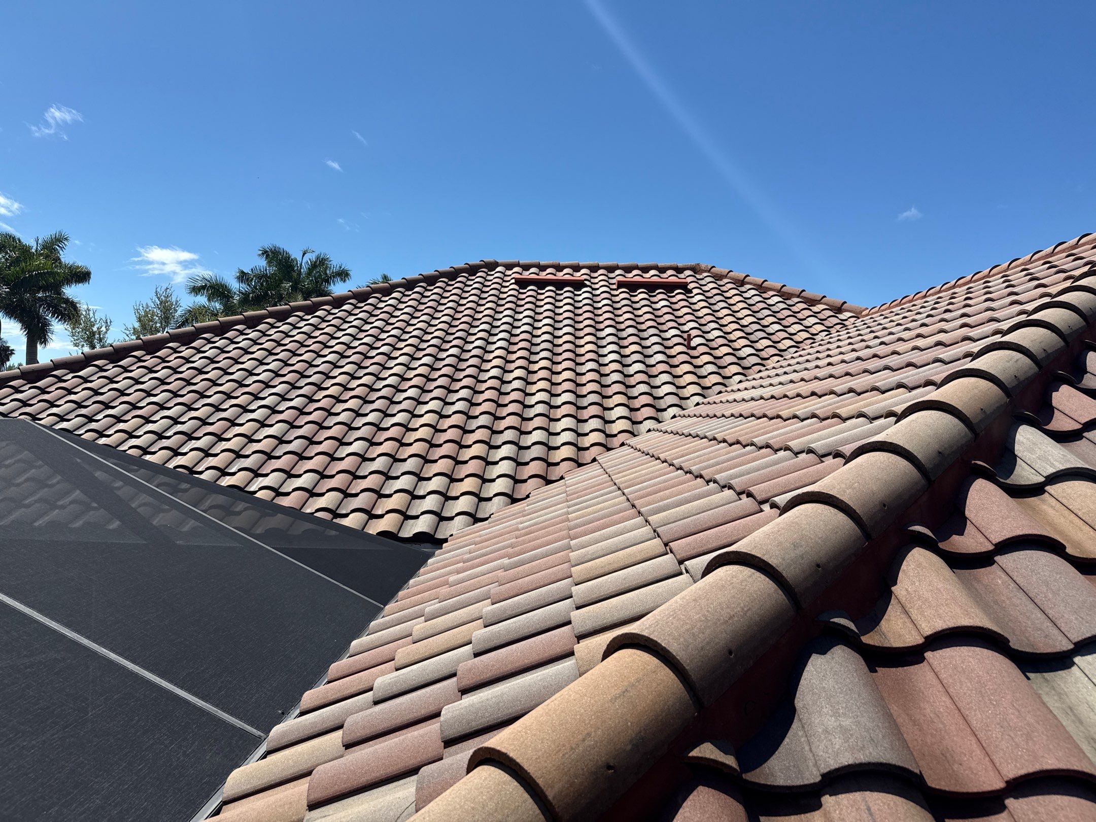 This project focused on a full gutter clean-out to restore proper water flow and prevent overflow issues.  Our scope of work included: 	•	Removing heavy leaf and pollen buildup from the gutter system 	•	Clearing out clogged sections along the rear gutters near the pool cage, where debris tends to accumulate more heavily 	•	Inspecting and cleaning the front gutter guards, which had several blocked areas restricting water flow 	•	Ensuring all downspouts and channels were flowing properly after service  Even with gutter guards installed, debris like pollen, shingle grit, and fine organic matter can still build up over time—especially in Florida’s environment. Regular maintenance helps prevent water damage, overflow, and staining on exterior surfaces.  Another thorough job completed by Sunshine AquaWash® – keeping homes protected from top to bottom. by Sunshine AquaWash