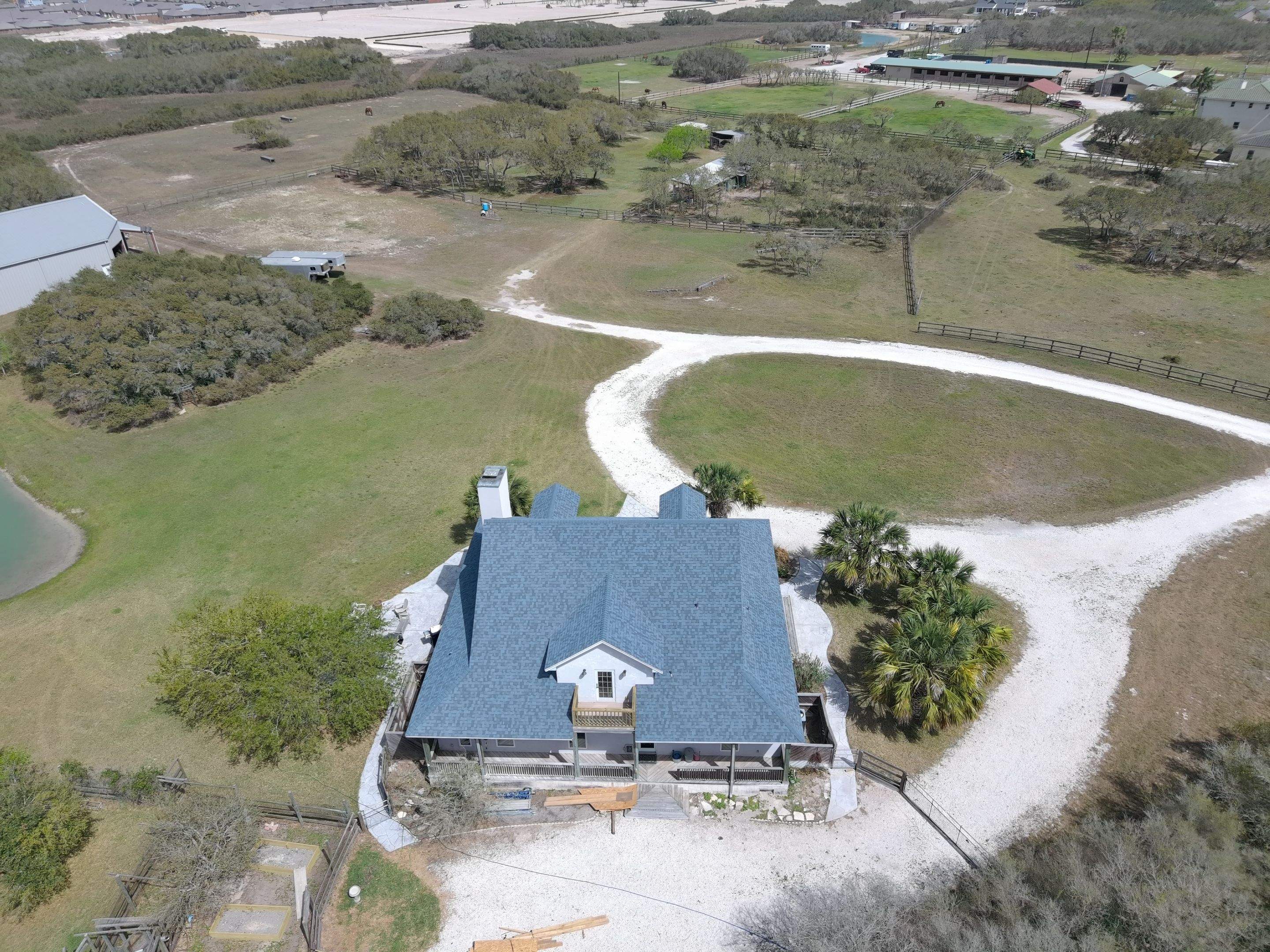 Long Horn Retreat by Bayfront Roofing and Construction