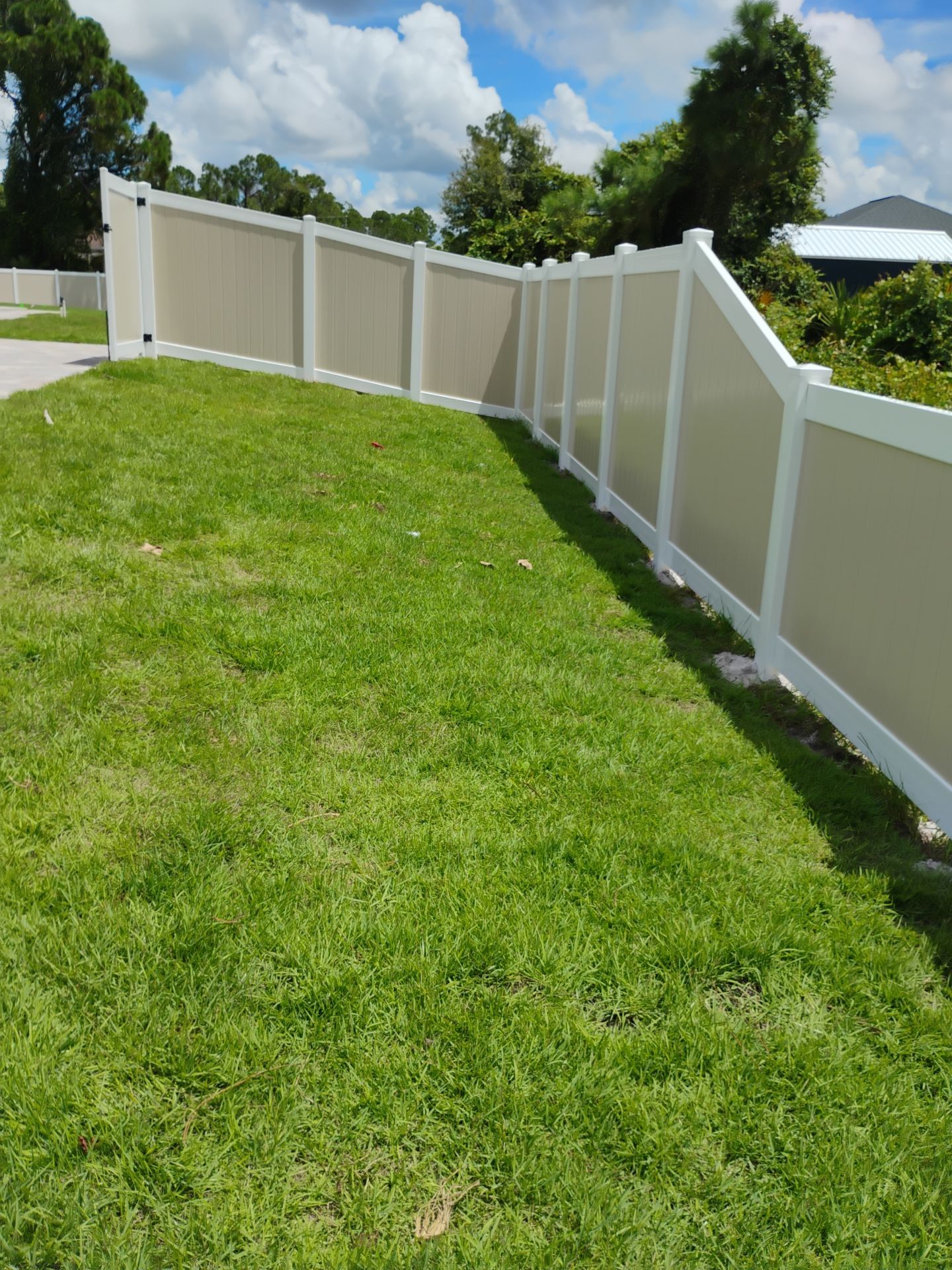 Custom Two-Tone Vinyl Privacy Fence Installation in North Port by True Fence LLC