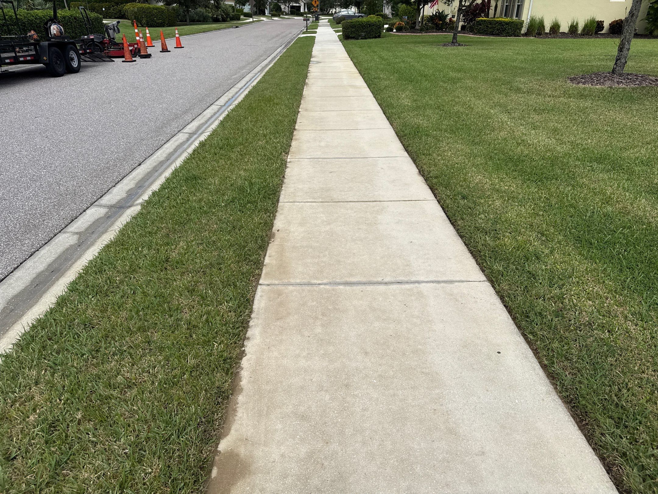 Driveway, Sidewalk & Lanai Cleaning Transformation | Forest Creek Parrish, FL by Sunshine AquaWash