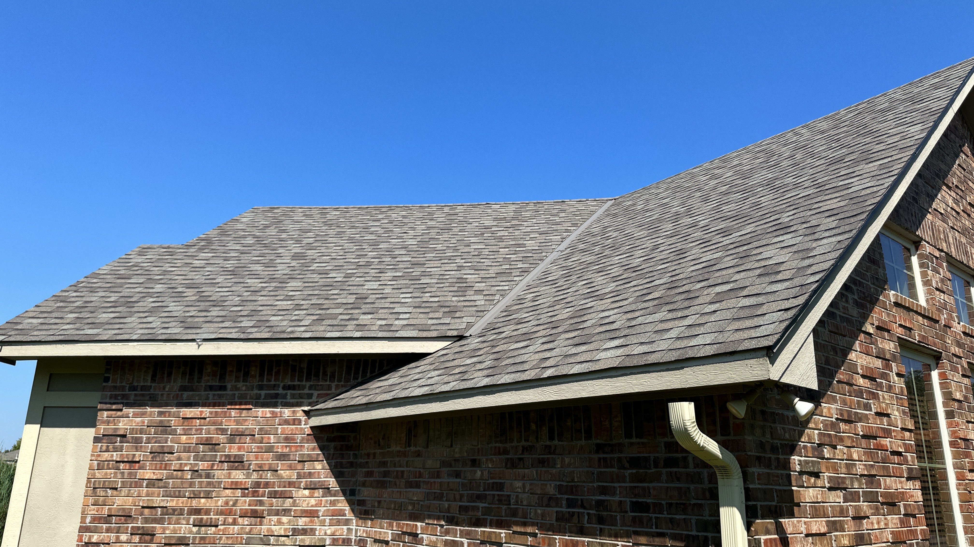 Reroof using Owens Corning Duration Storm IR in Driftwood by Castillo Roofing
