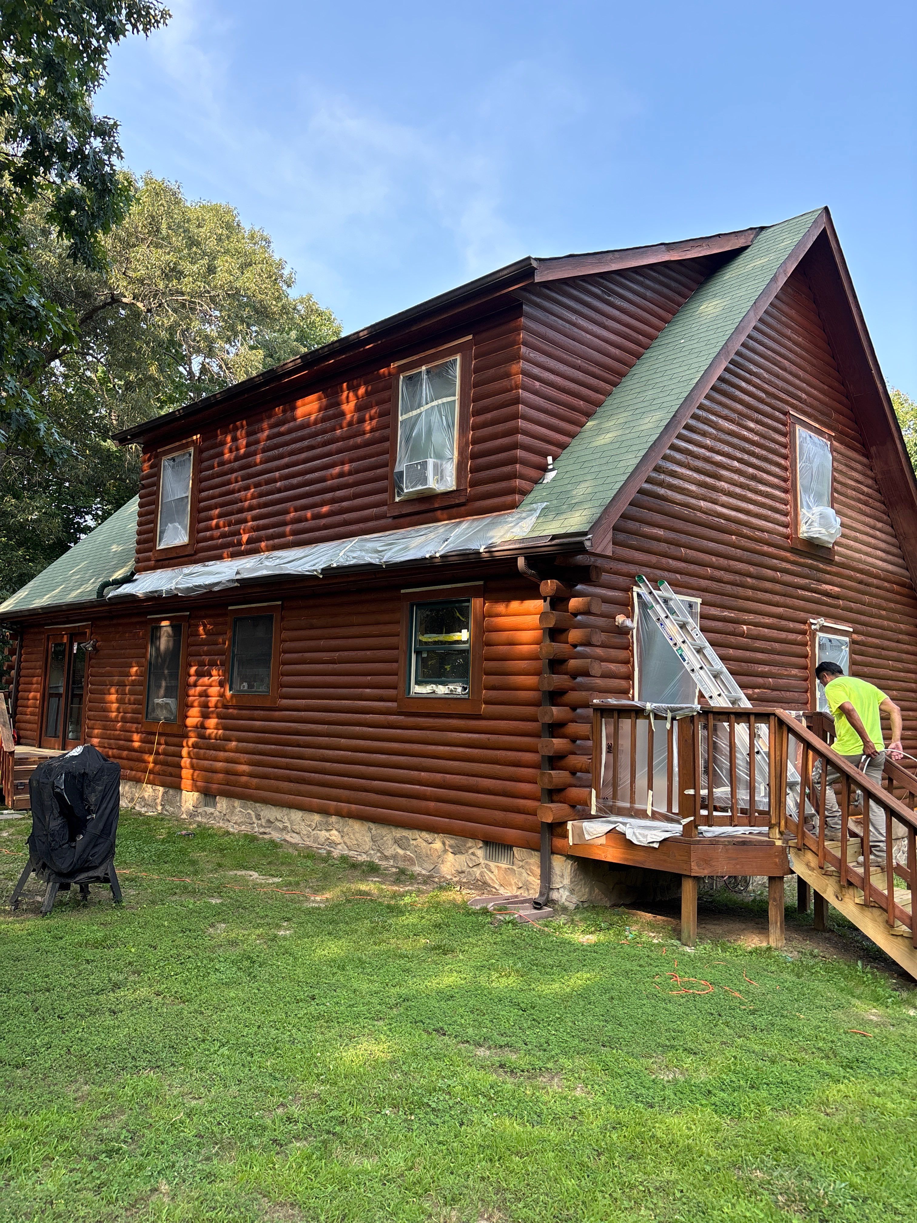 Jay's Log Cabin Re-Stain by Highfill Painting