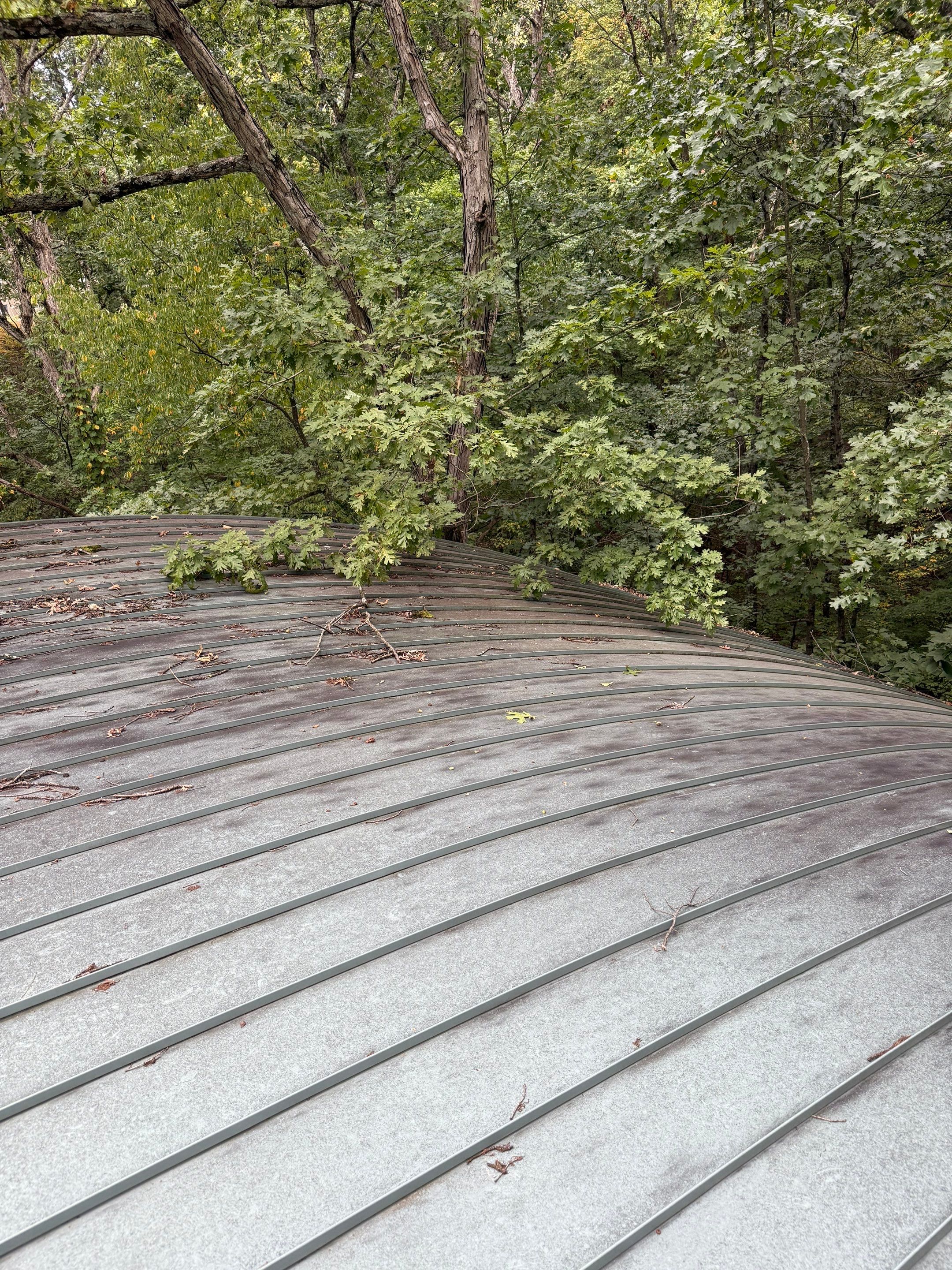 Standing Seam Curved Metal Roof System by Assured Restoration