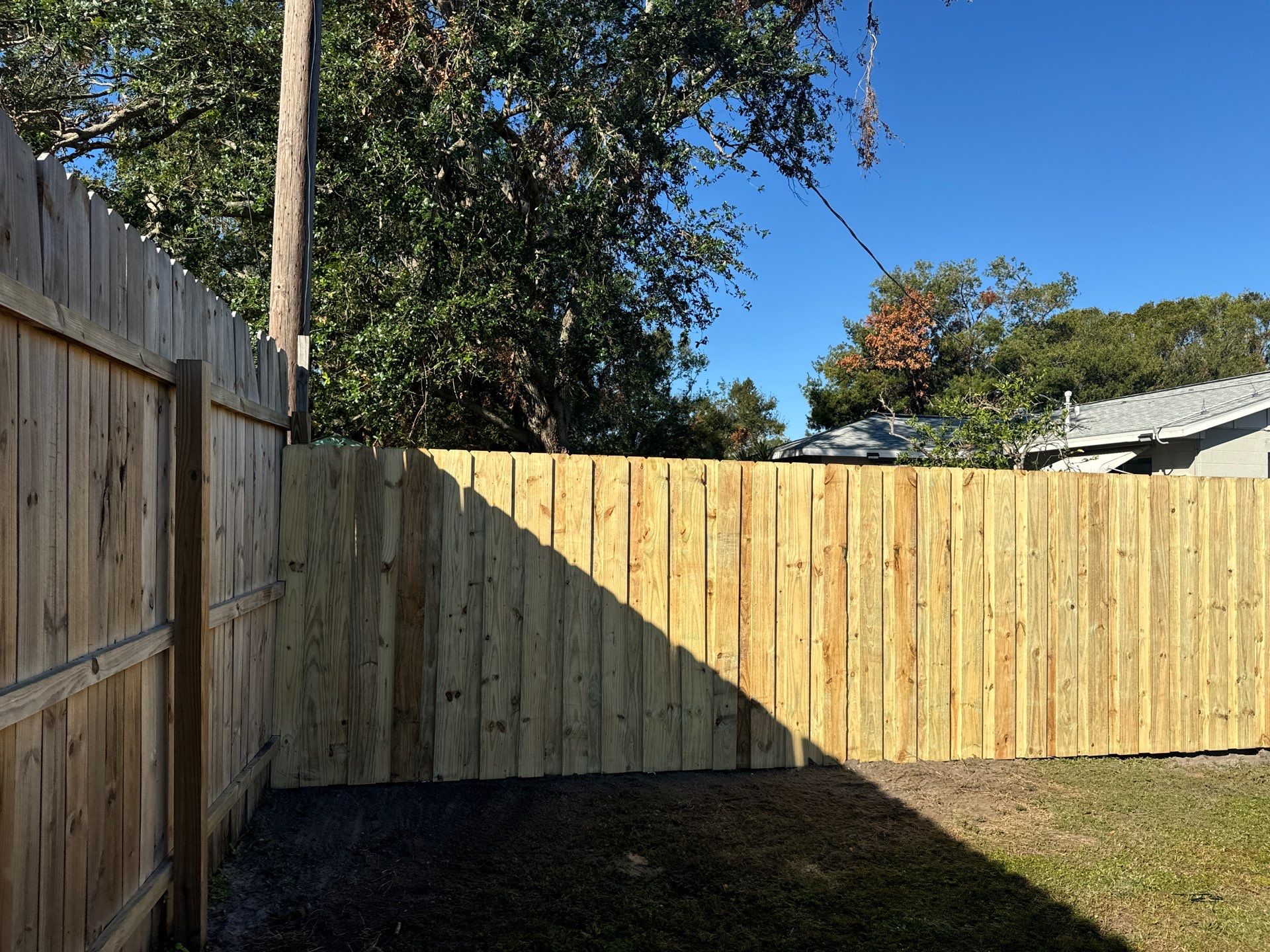 Wood Fence Installation using 6Ft Pressure Treated Wood Board On Board Privacy Fence by Asap fence and gates, LLC