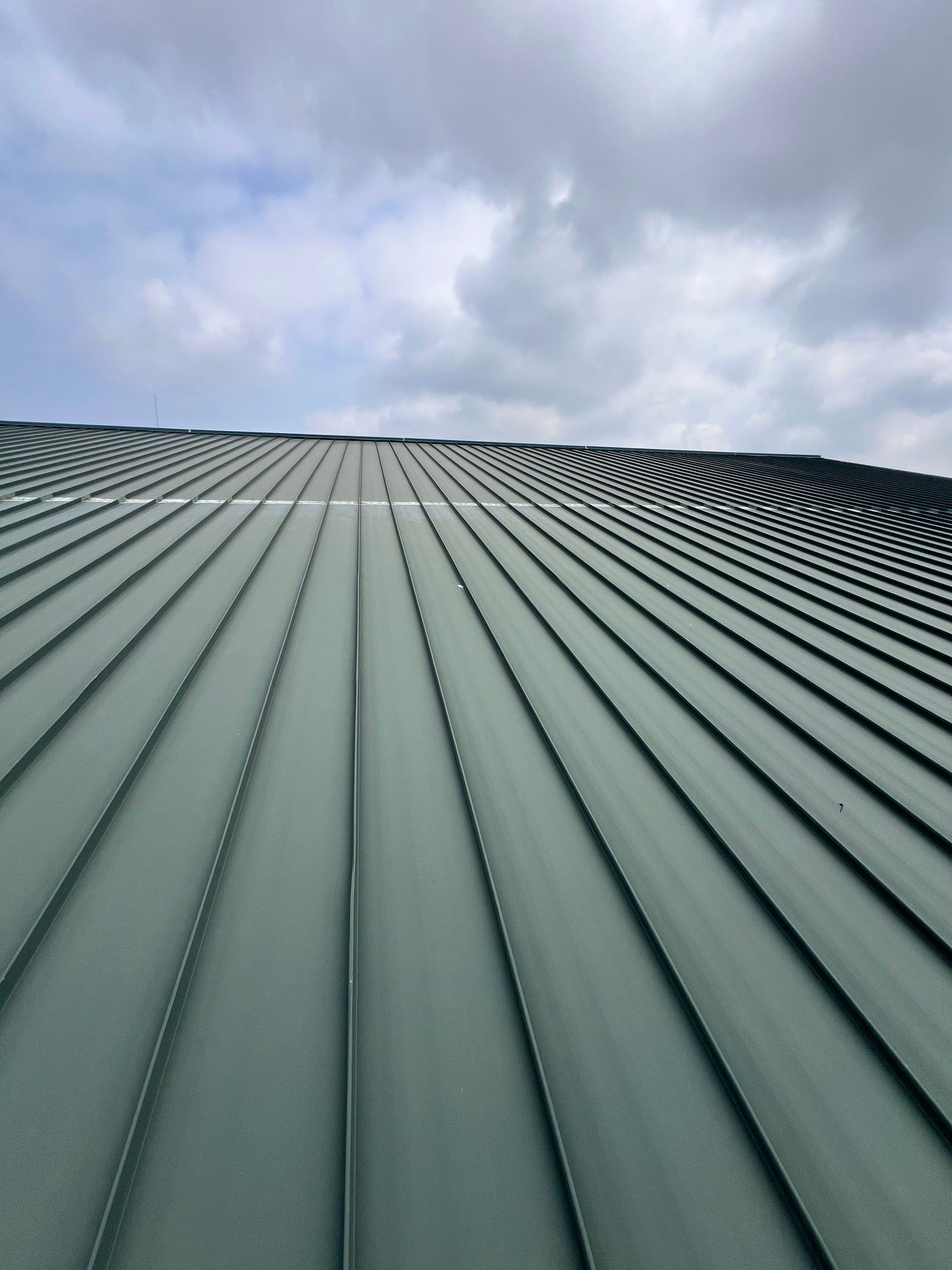 Hail Damage using Metal by Roof Repair Company