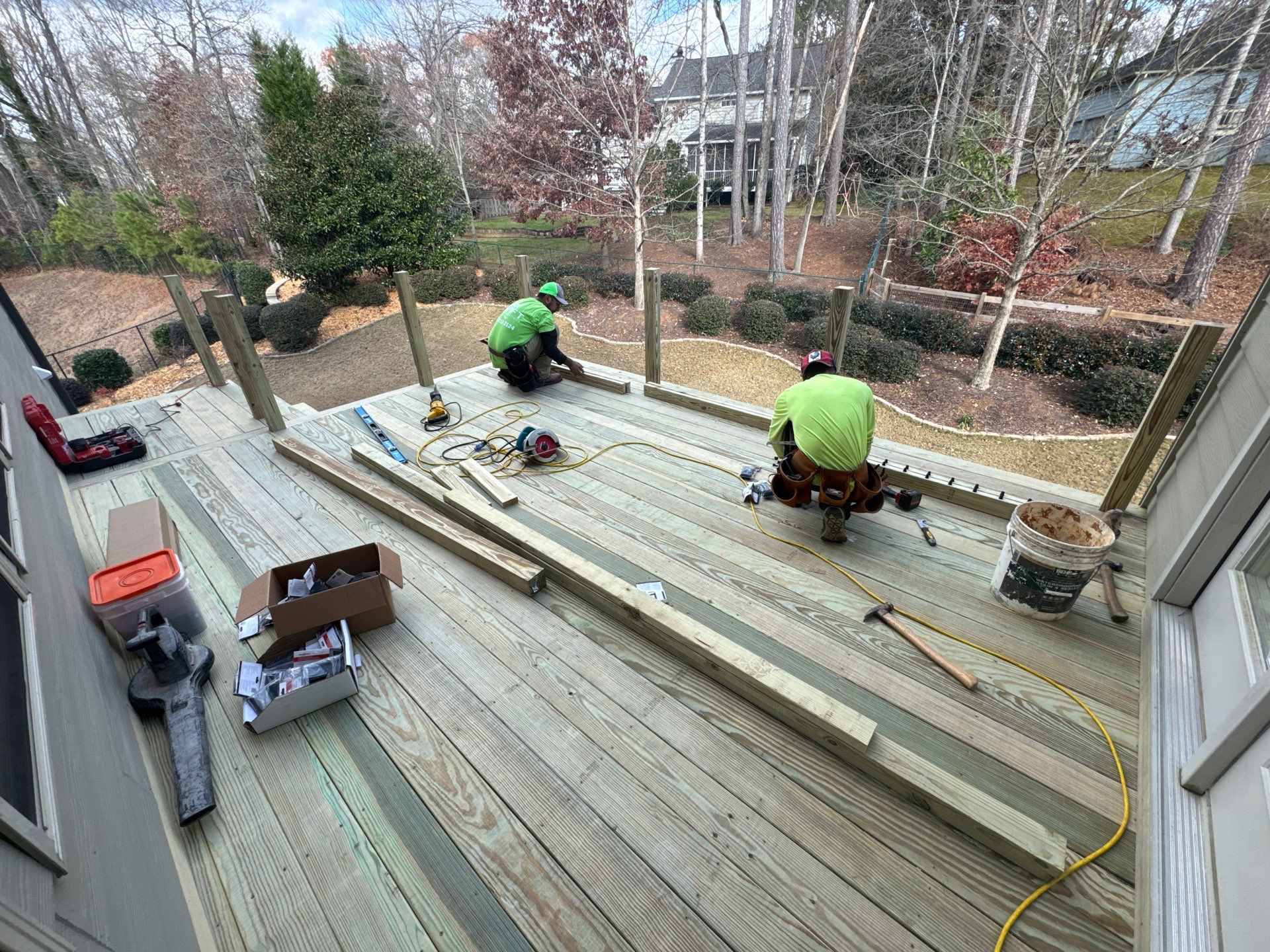 Custom Pressure-Treated Deck with Metal Balusters in Marietta by Swift Home Renovations
