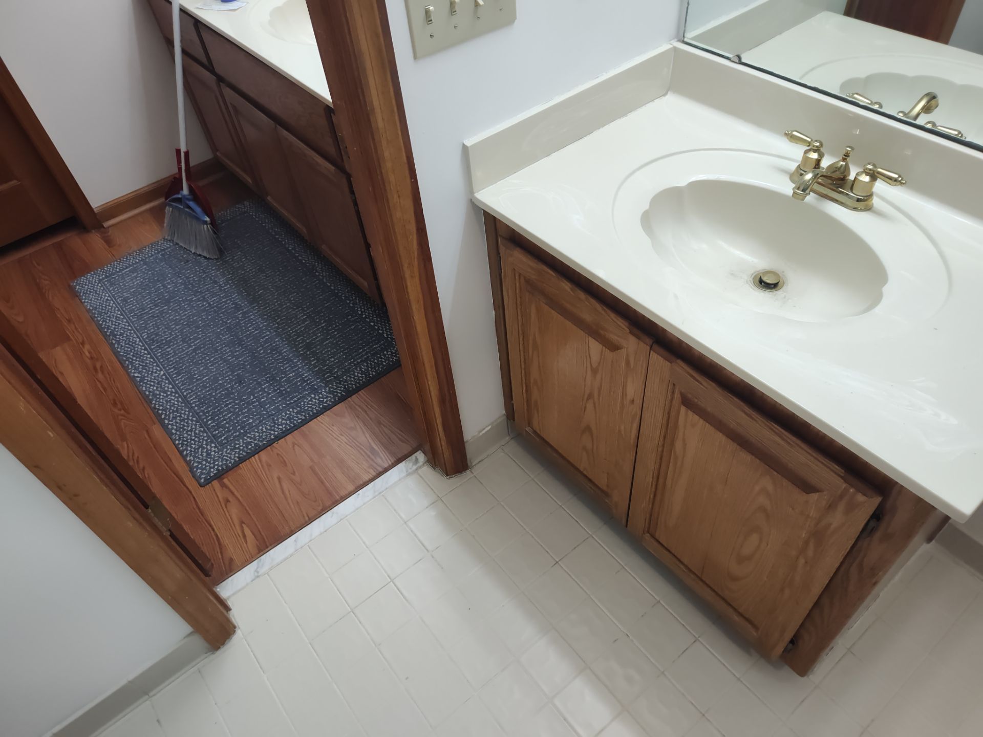 Bathroom Remodel using Onyx base and shower walls with seat & caddie by Cornerstone Home Builders, LLC