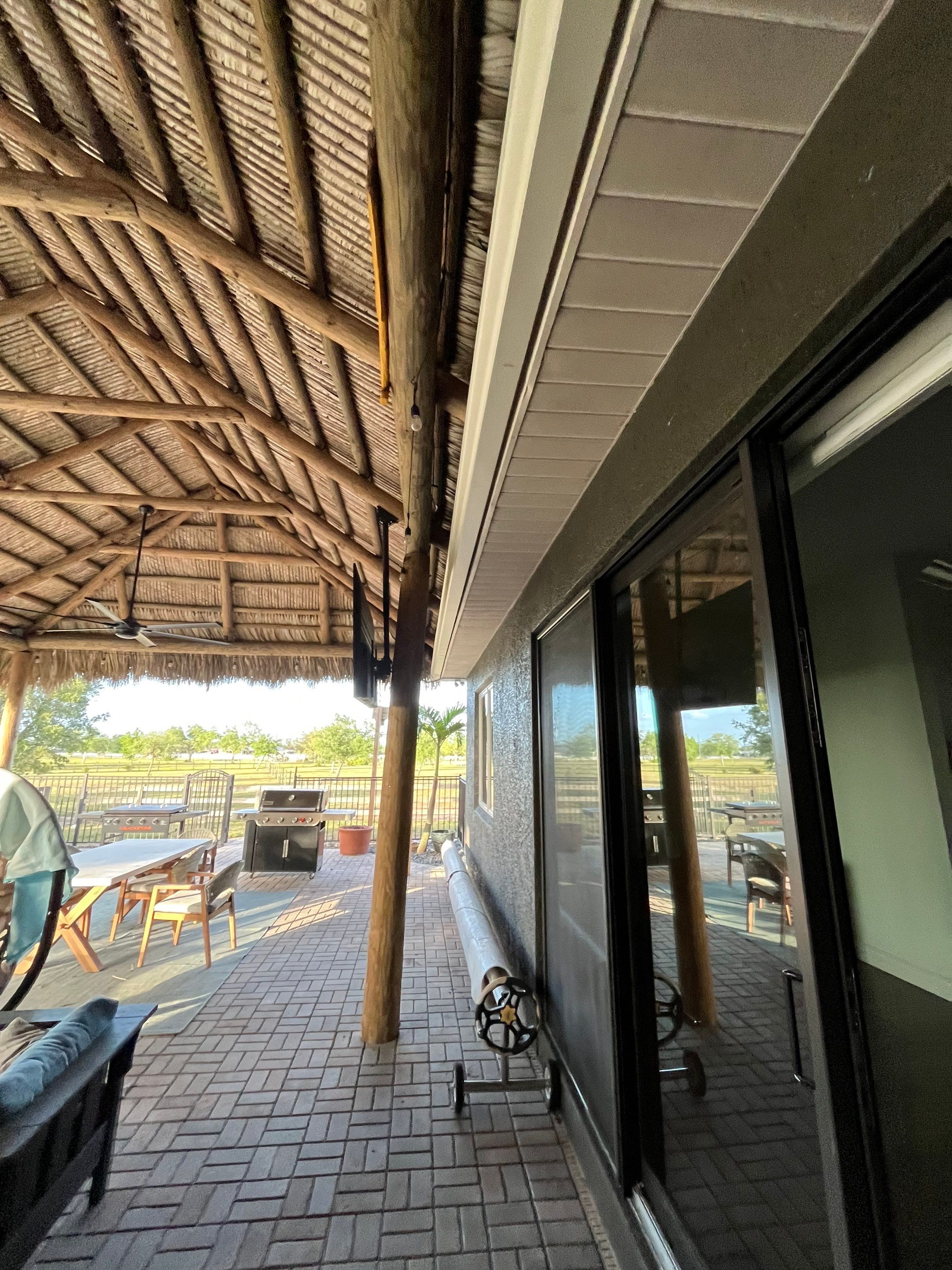  7-inch White seamless gutters and downspouts in Myakka City FL by Gutter Professors