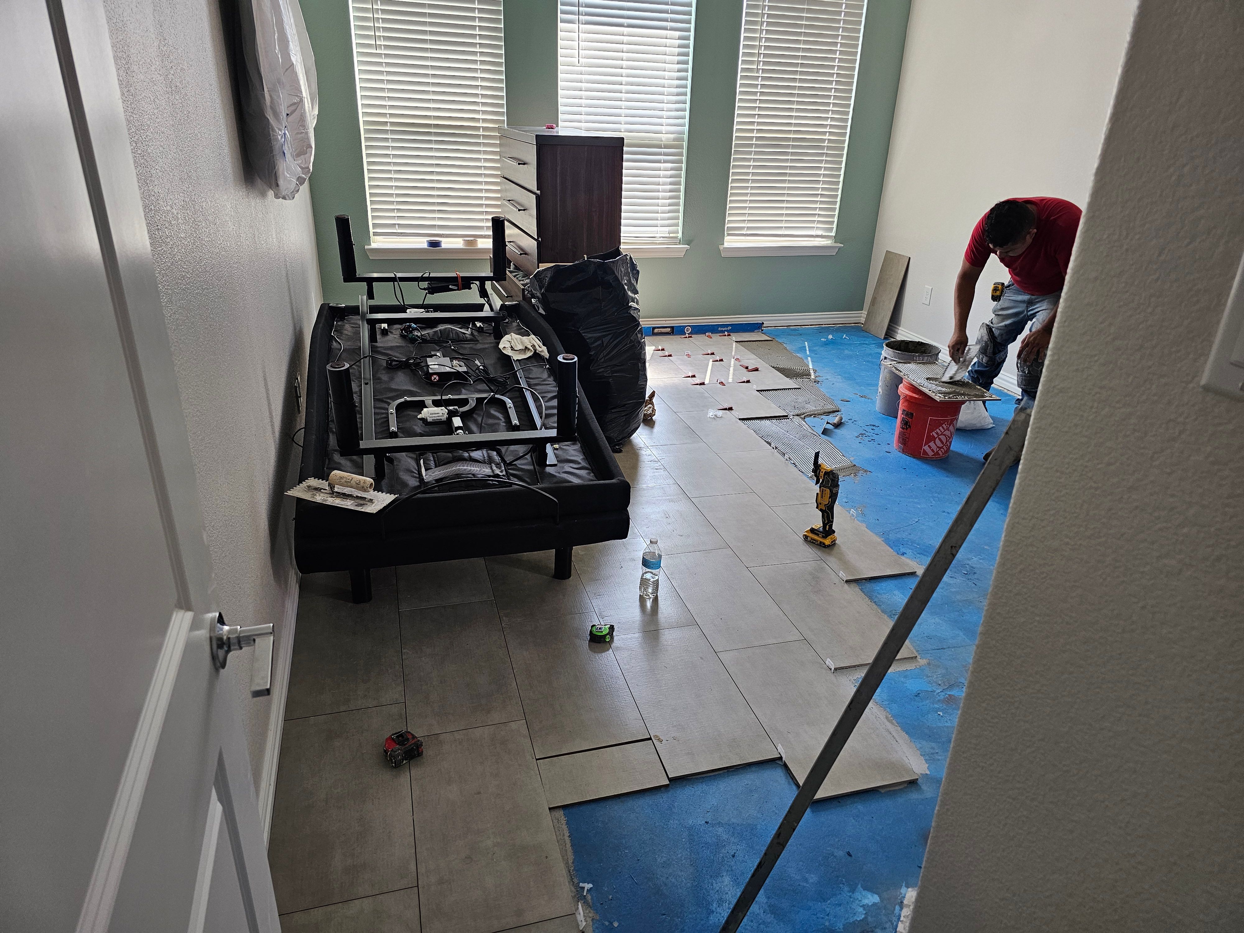 Carpet replacement with Tile and Red Oak Stairs by EL-GC LLC 