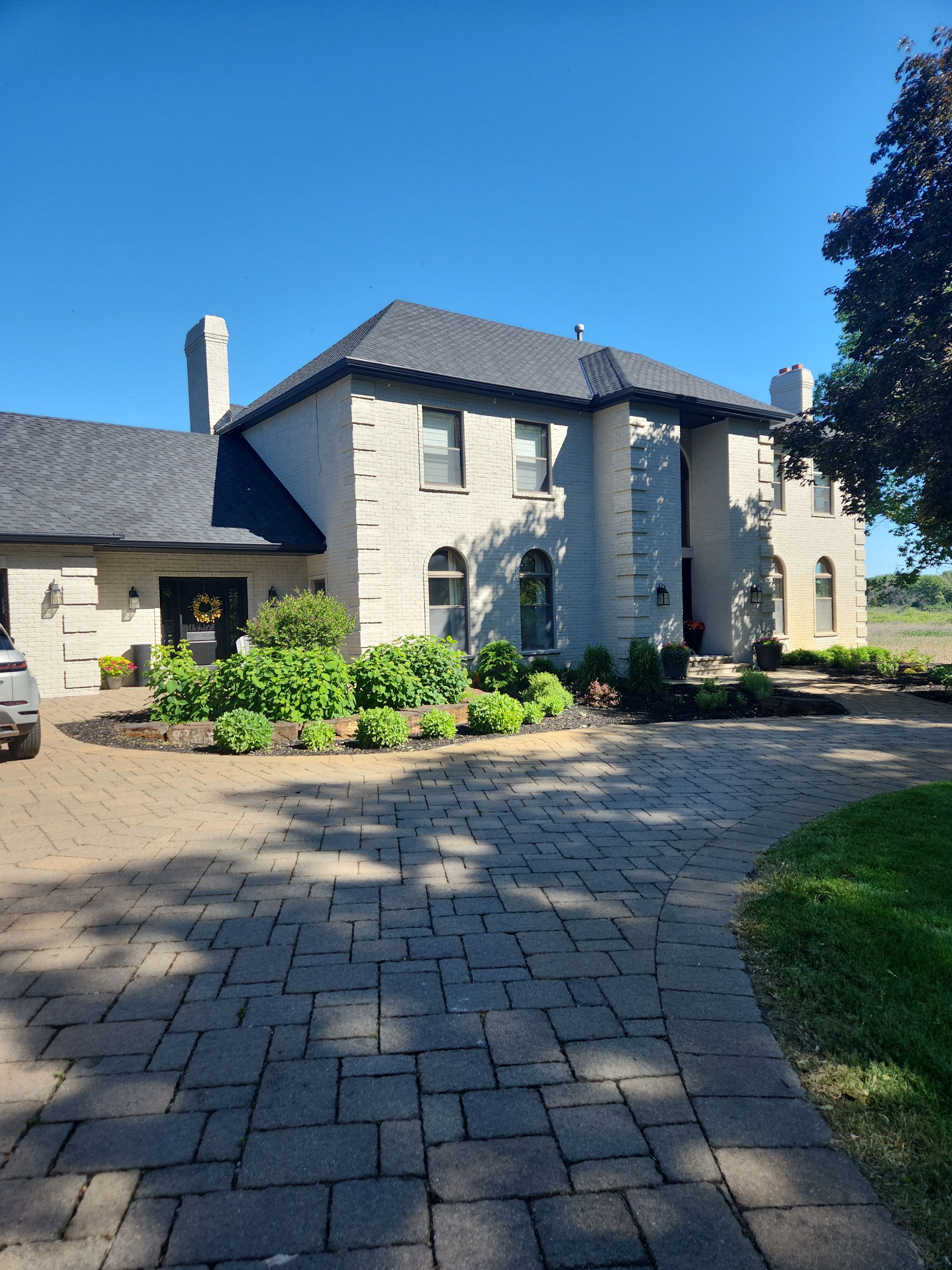 6" Black Gutters in White Bear Lake  by Next Level Seamless Gutters / Exteriors Inc.
