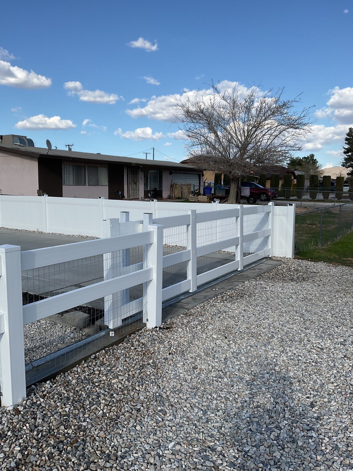 Wrought Iron Frame Ranch Style Sliding Gates by Fence Guys Inc.