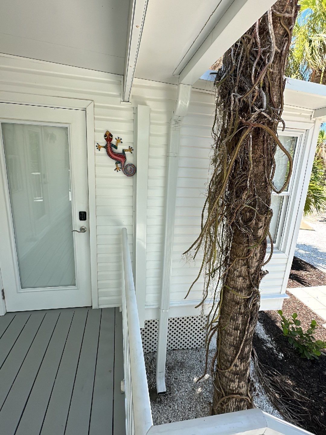 Downspout Installation using Charcoal Grey in Sanibel FL by Gutter Professors