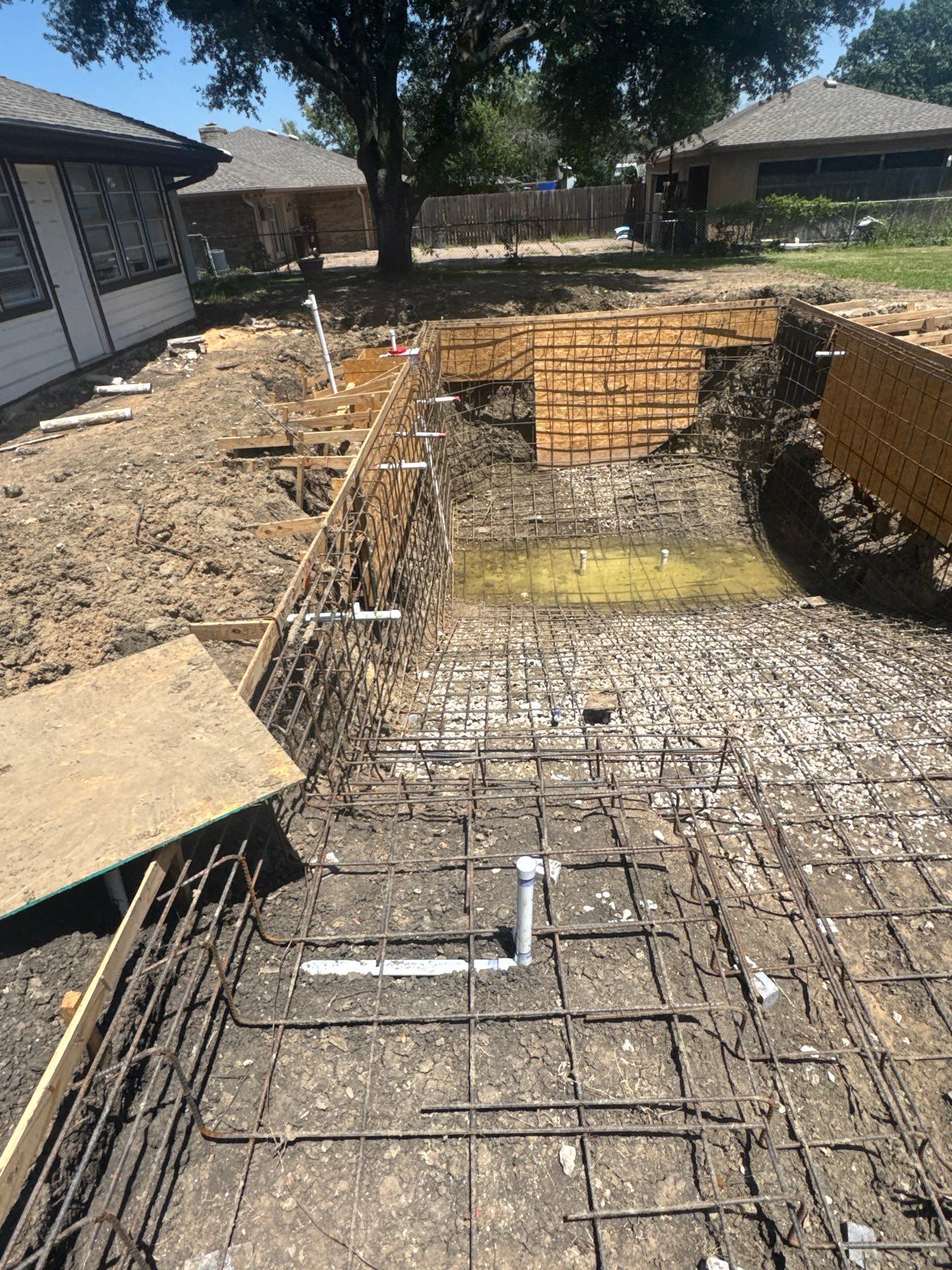 Crisp Geometric Pool with White Coping by Pinnacle Pools and Spas - DFW