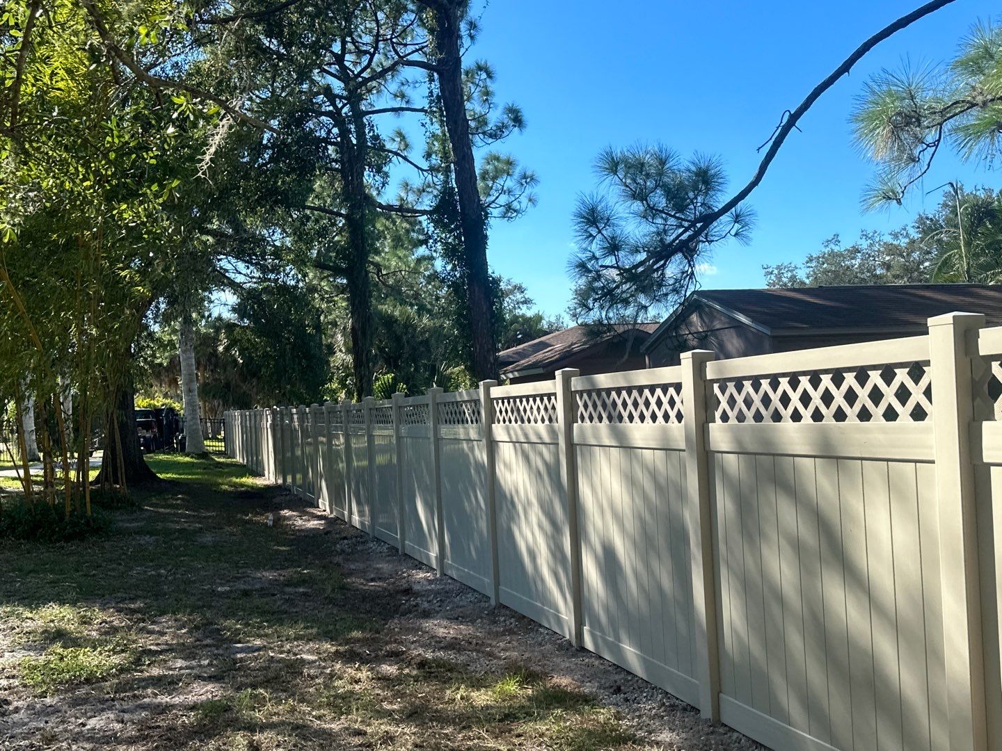 Vinyl Fence Installation using 6Ft Tan Vinyl Privacy Fence with Lattice Top by Asap fence and gates, LLC