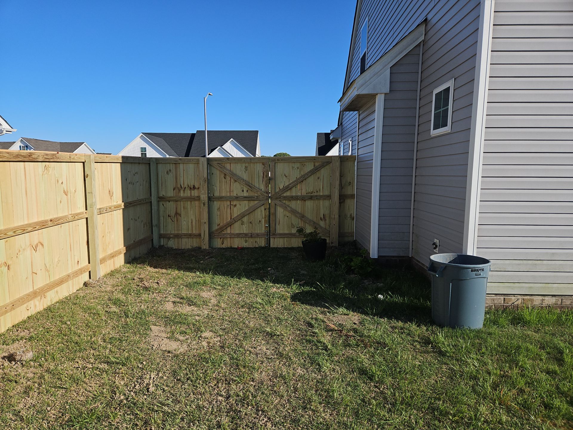 Stronger. Sleeker. Wood. by Tidewater Fence