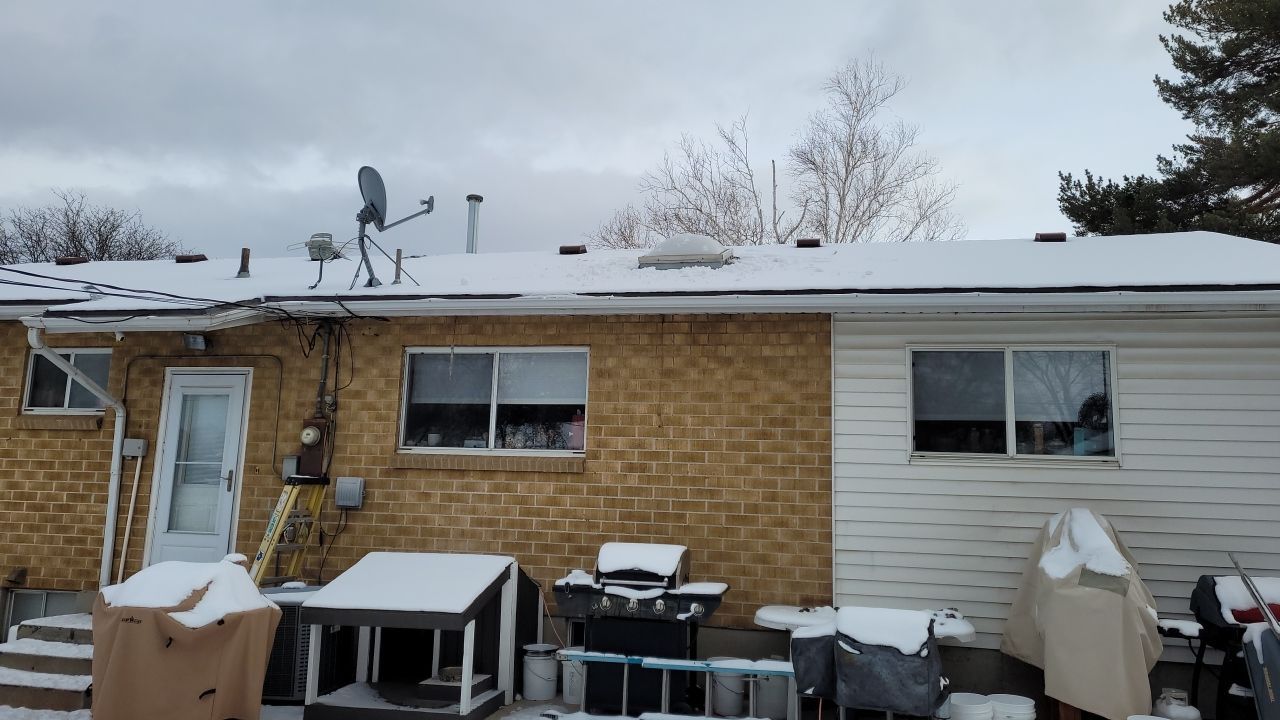 Skylight Removal using Shingle Repair by The Roof Doctor