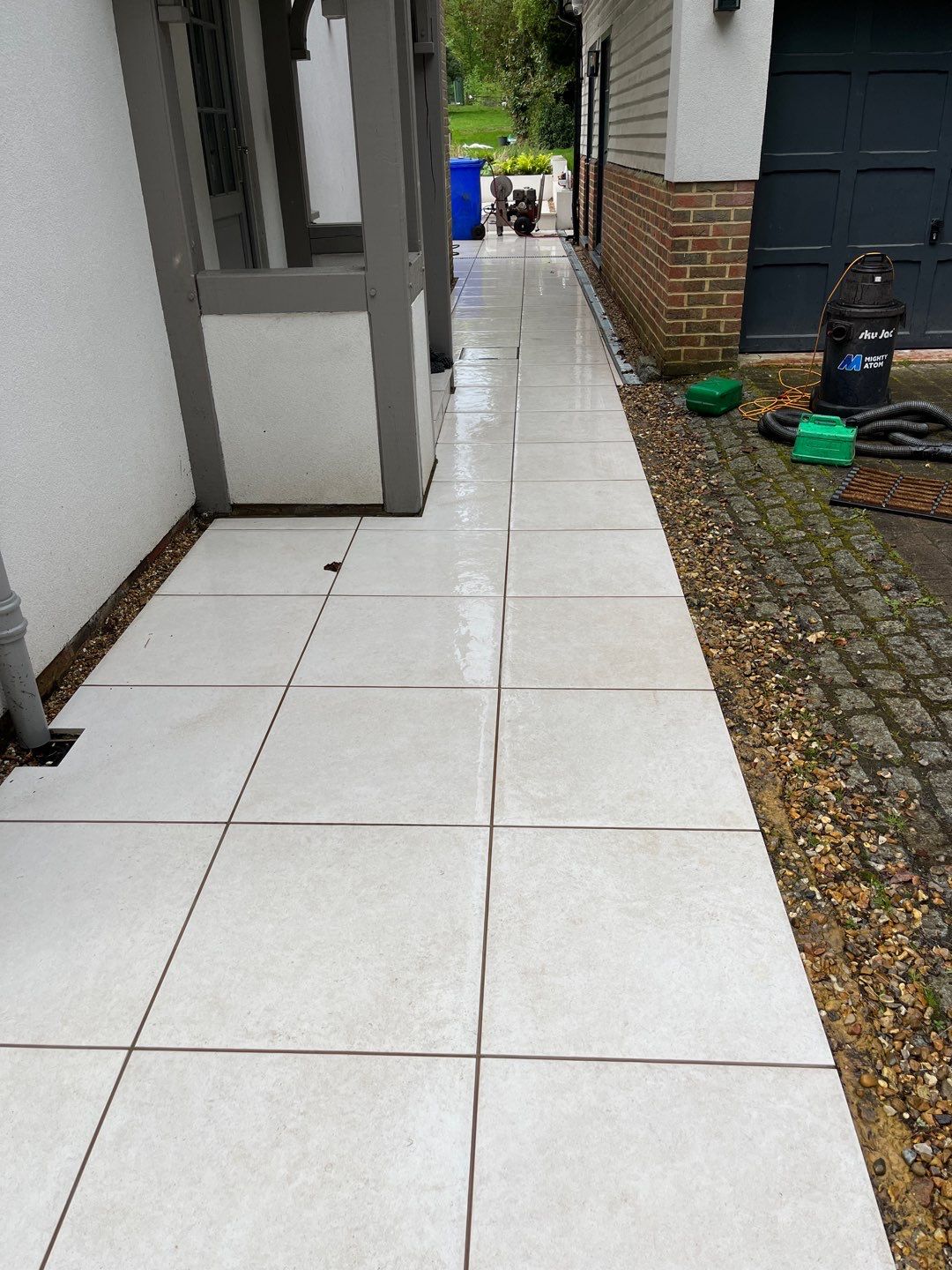 Porcelain Patio Clean using Honda 15lpm Low Pressure Washing Machine by Ges Exterior Cleaning ltd
