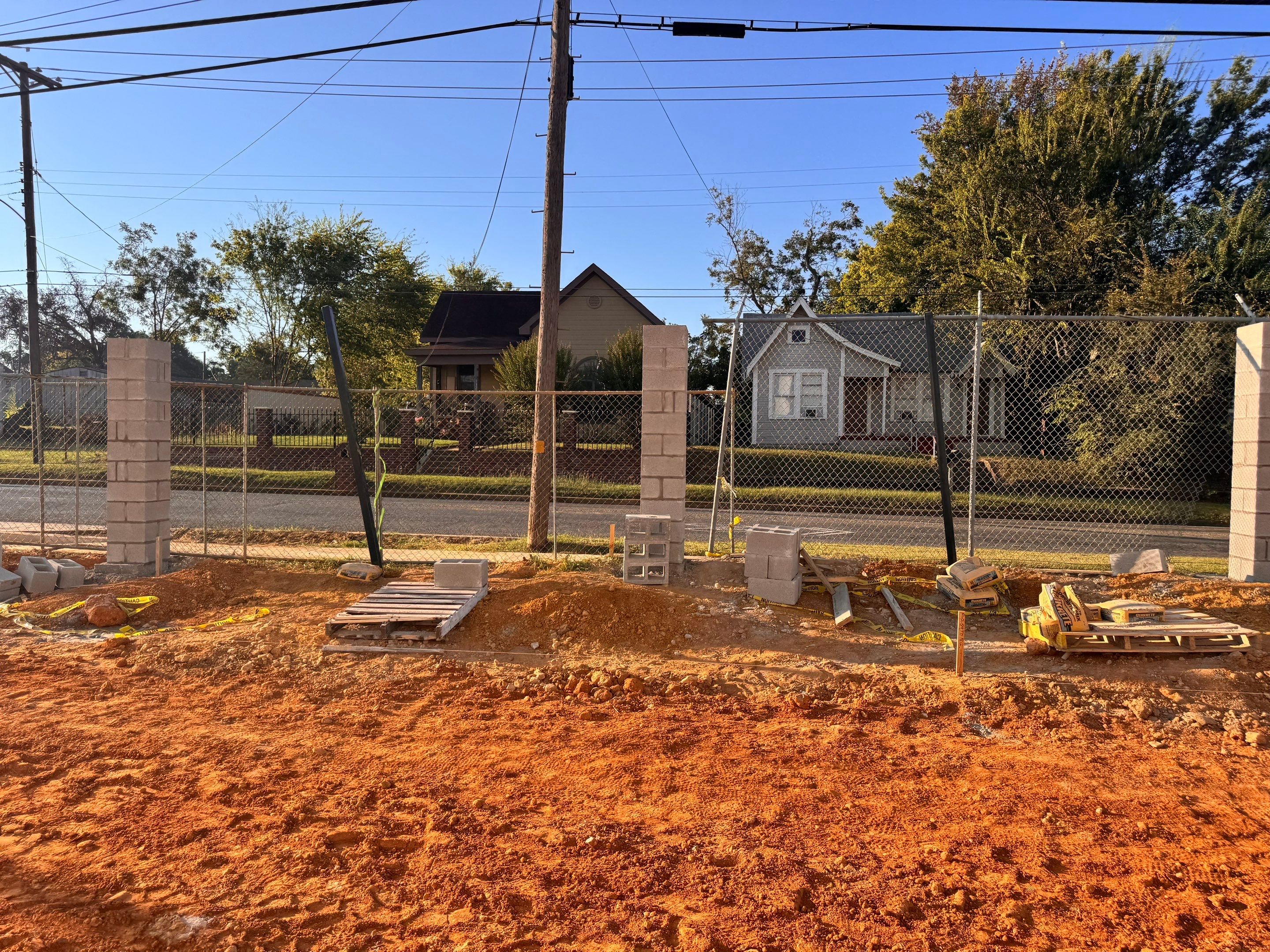 Commercial Fencing - Wrought Iron with Concrete columns by 3:16 Roofing and Construction