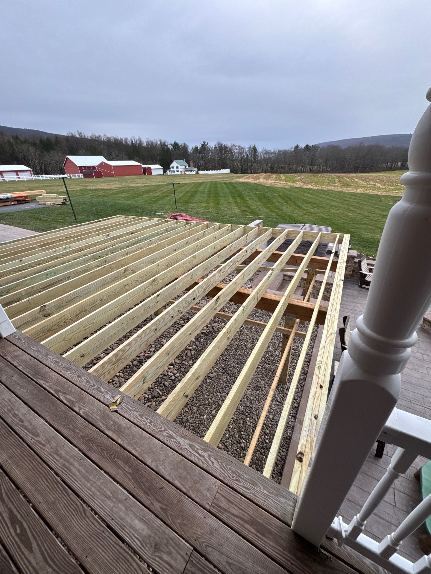 Covered Deck Addition With Custom Gable Roof in Tower City by Esh Builders