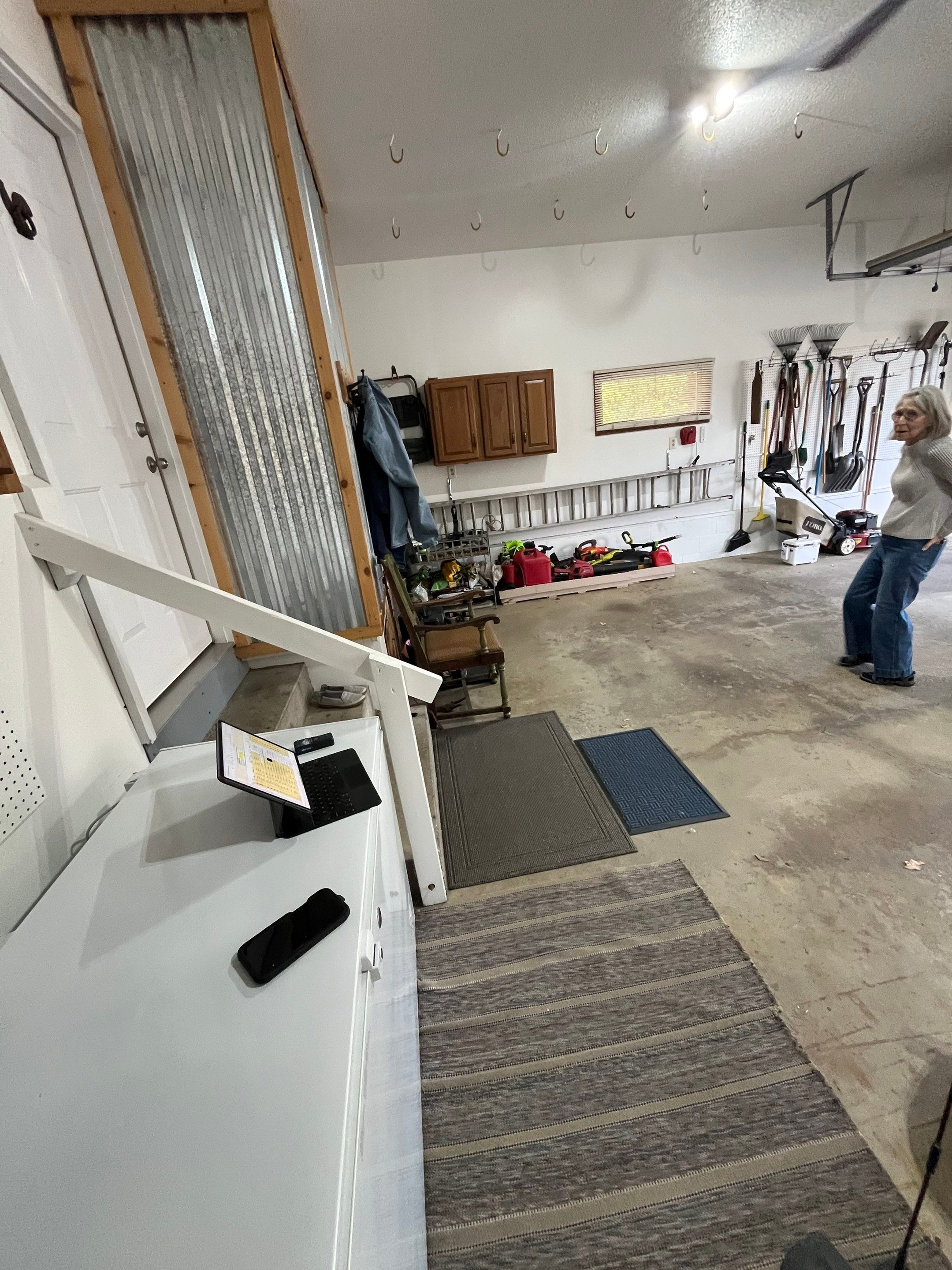Multi-Colored Flake Epoxy Garage Floor Coating and Crack Repair by Select Painting, Coatings & Garage Cabinets