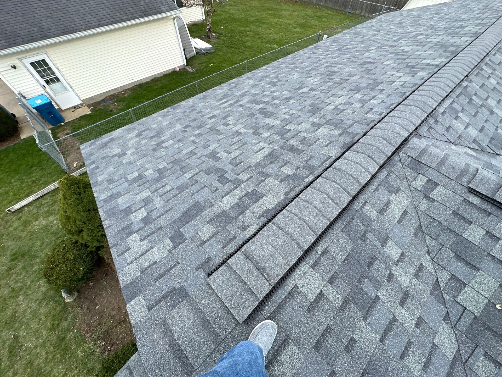 Storm Damage Residential Roof and Siding Installation by WIW Enterprises Inc