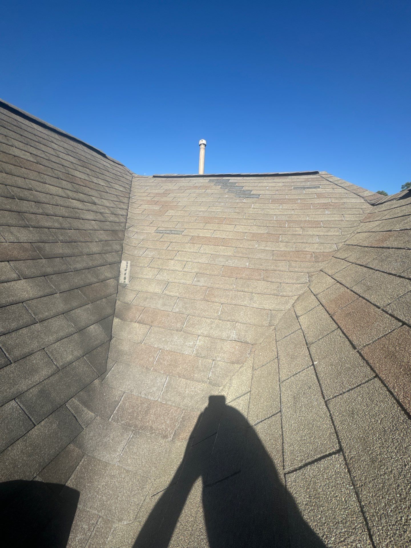 Missing Shingles Wind Damage  by Associates Roofing Unlimited 