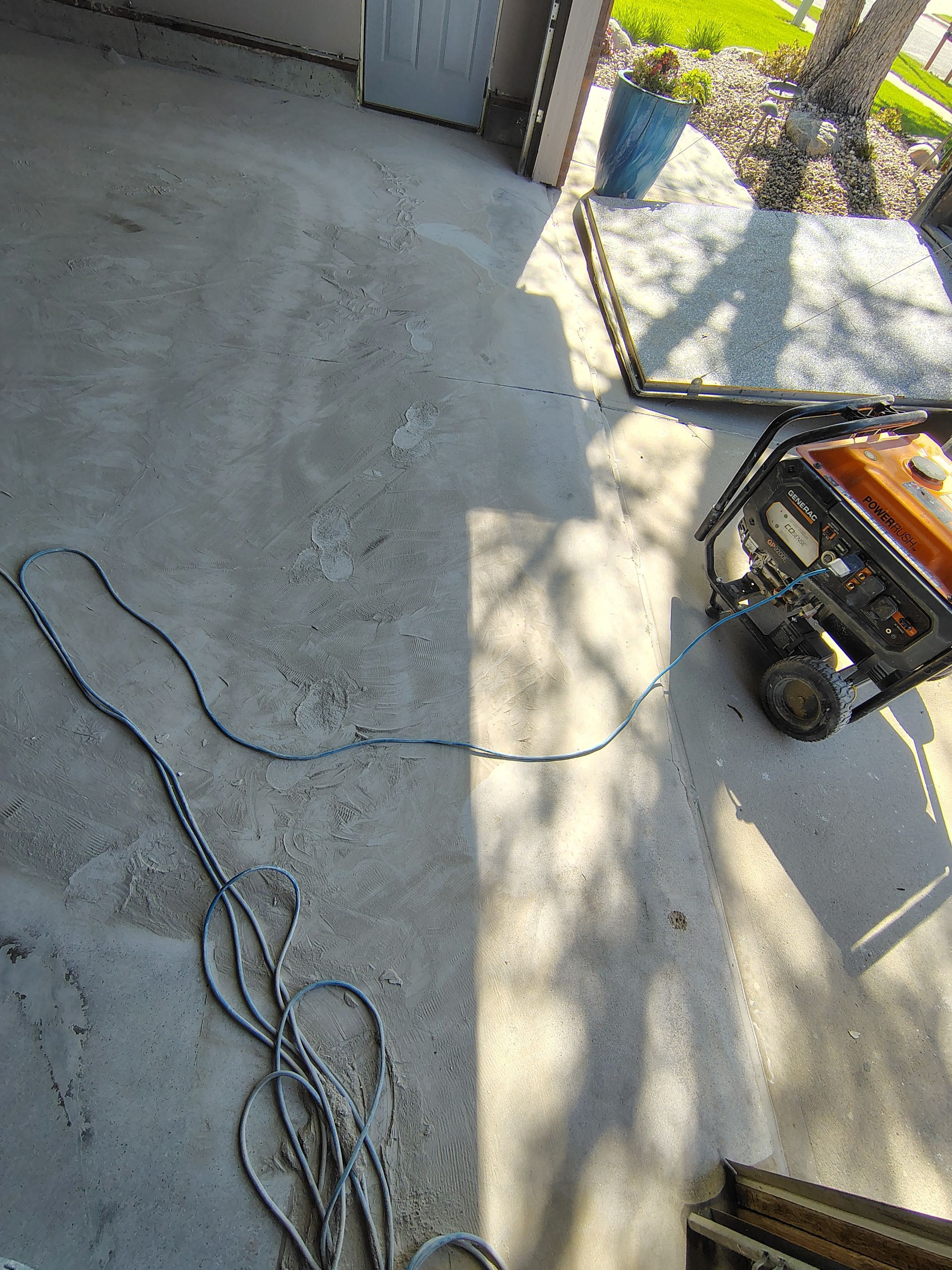 Sioux Falls Garage Concrete Repair and Epoxy Flake Floor Coating by Select Painting, Coatings & Garage Cabinets