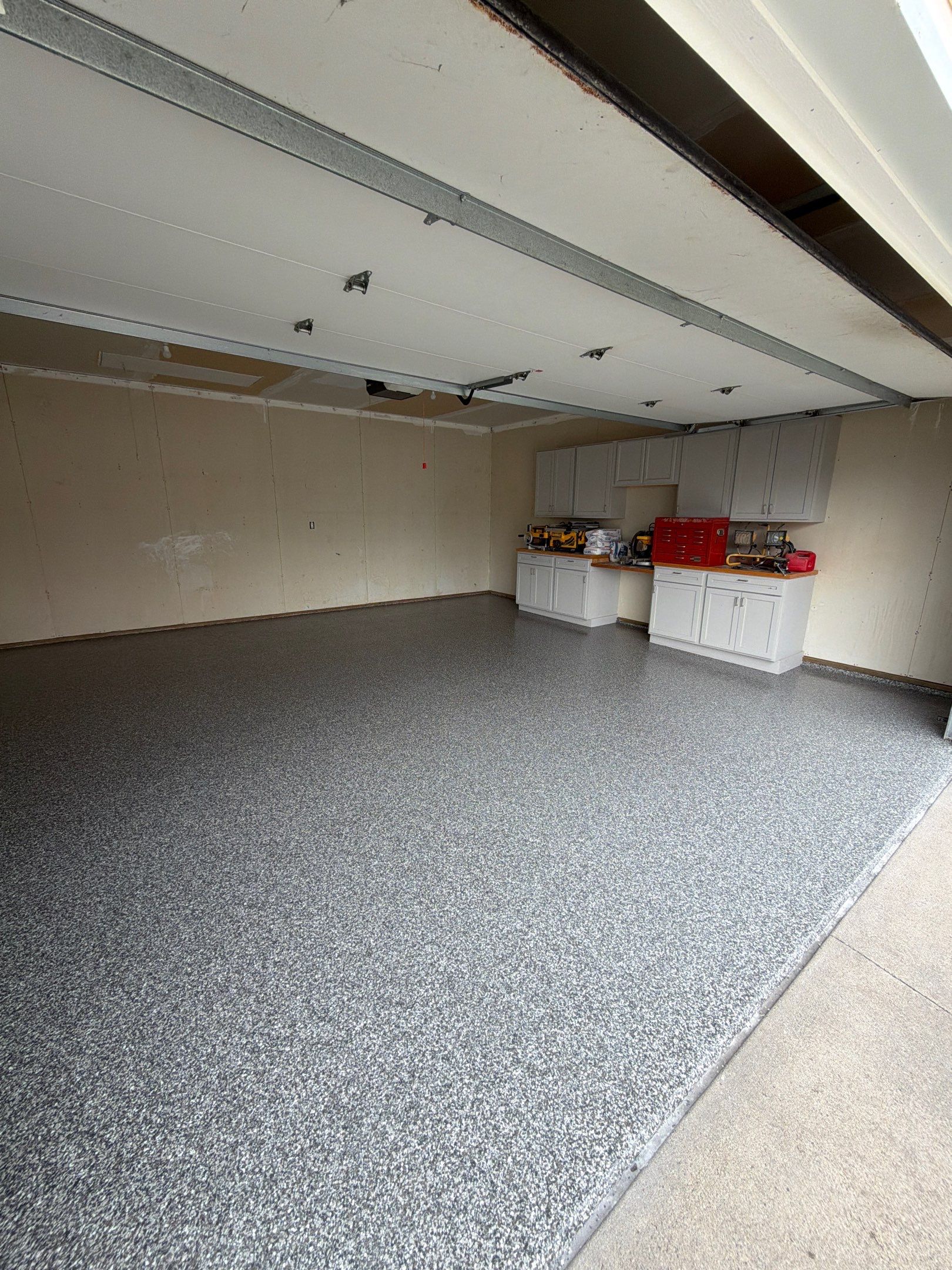 Ames Garage Floor Coating - Epoxy Replacement by Revival Concrete Coatings