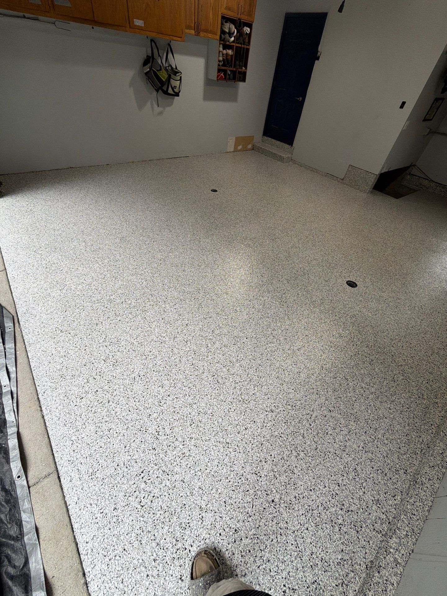 Custom Speckled Epoxy Flake Floor Installation in Grand Haven by Gordon Painting