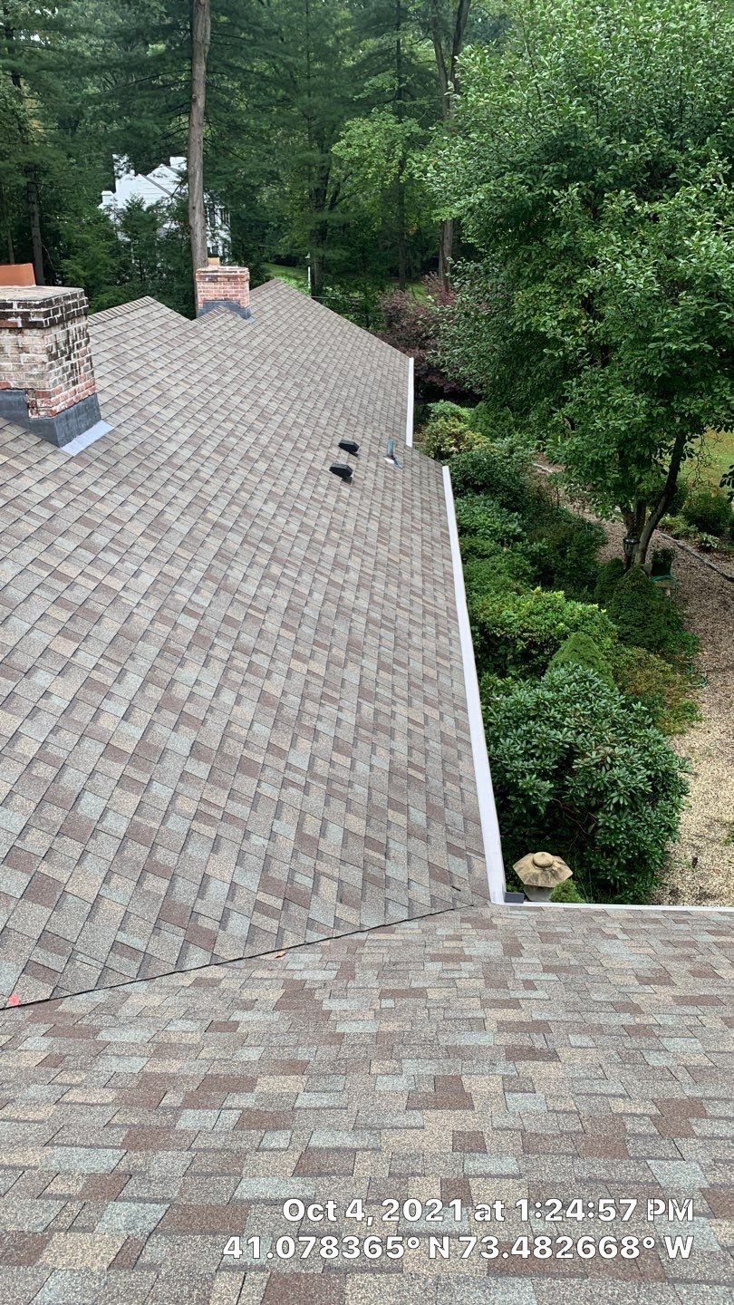Commercial Roofing Installation using Owens Corning Duration Driftwood by A Plus Exterior