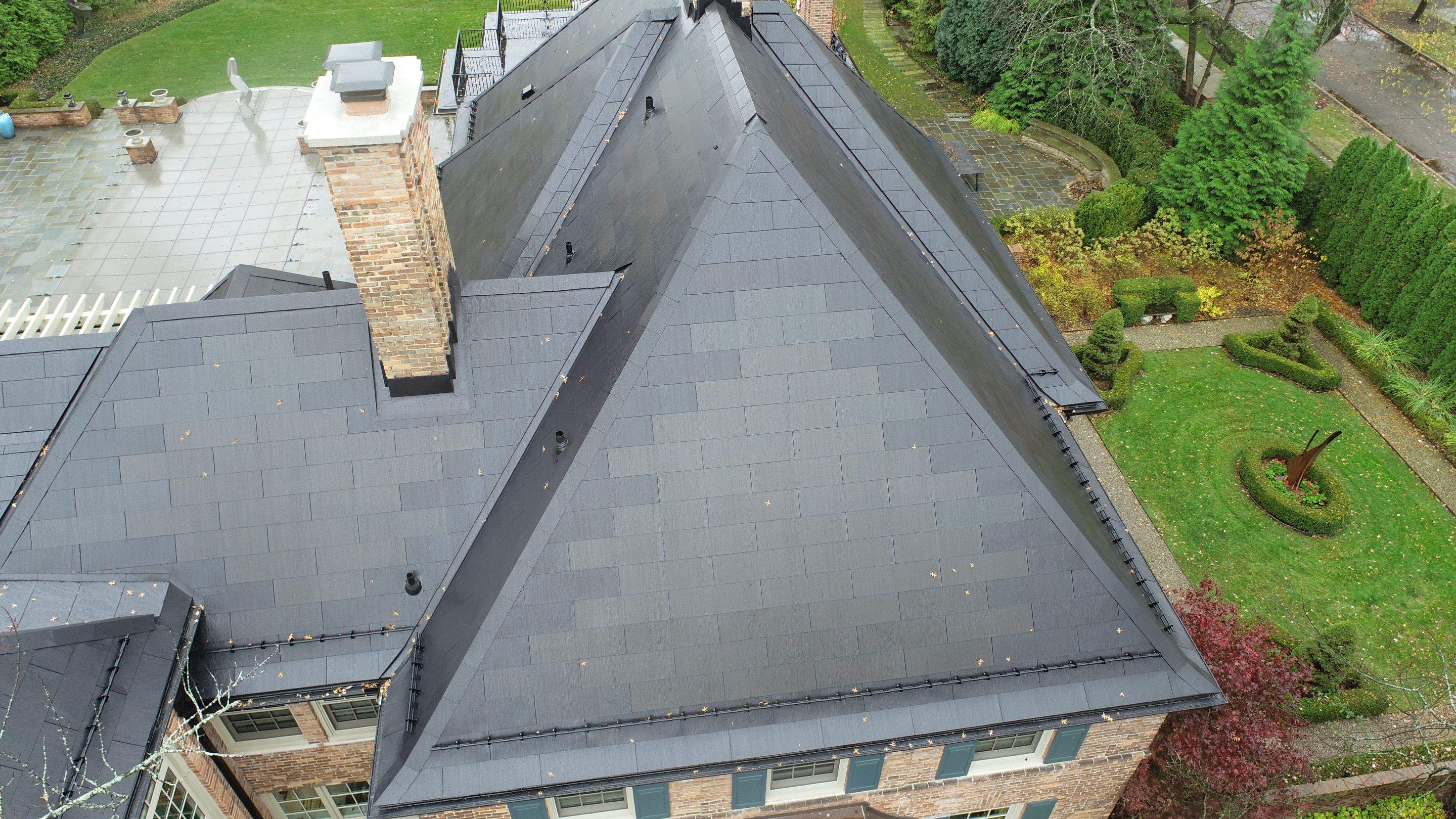 Tesla Solar Roof Replacement  by American Home Contractors