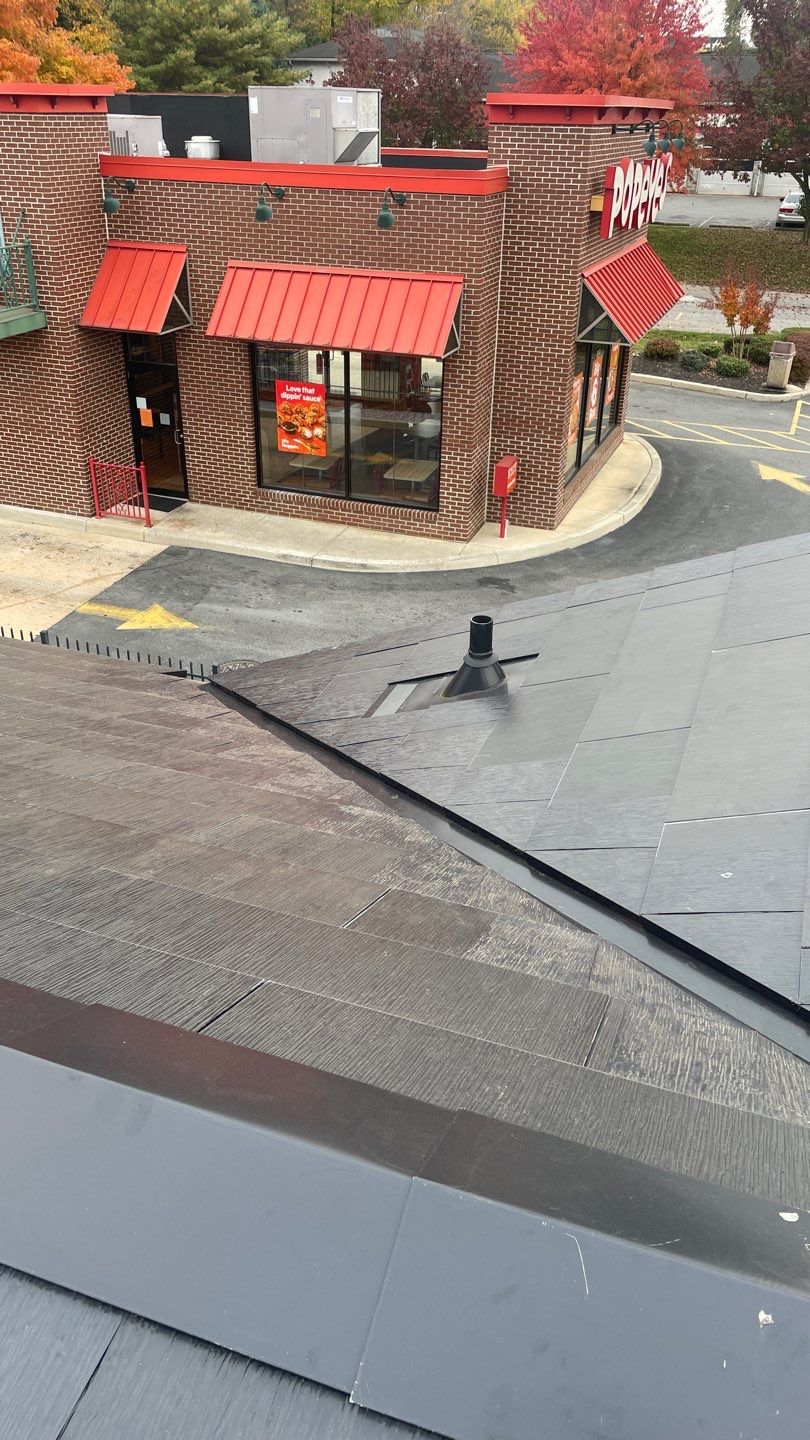 Tesla Solar Roof on a Commercial Building by American Home Contractors