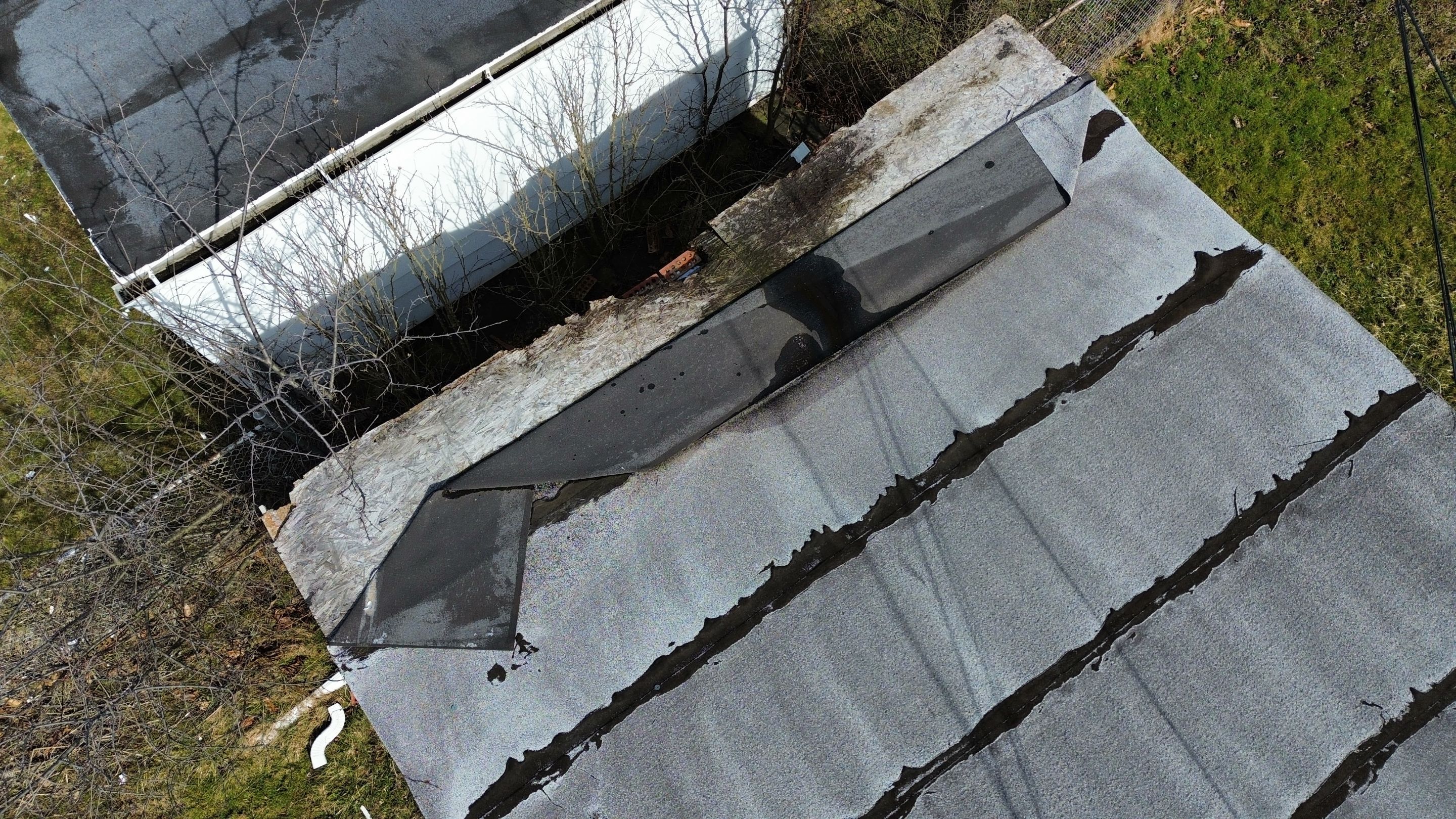 Detached Garage Roof and Decking Replacement by Atlas Roofing & Restoration